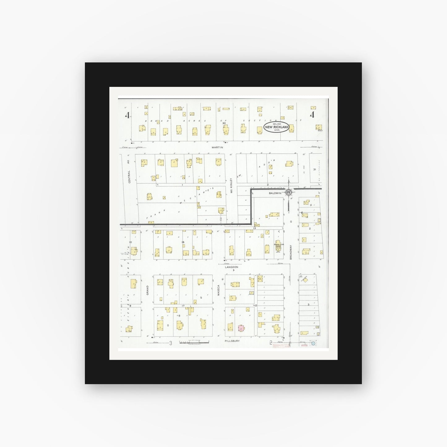 Old map wall art mockup — black gallery frame with white mat — Sanborn Fire Insurance Map from New Richland, Waseca County, Minnesota (1930), Sheet #0004