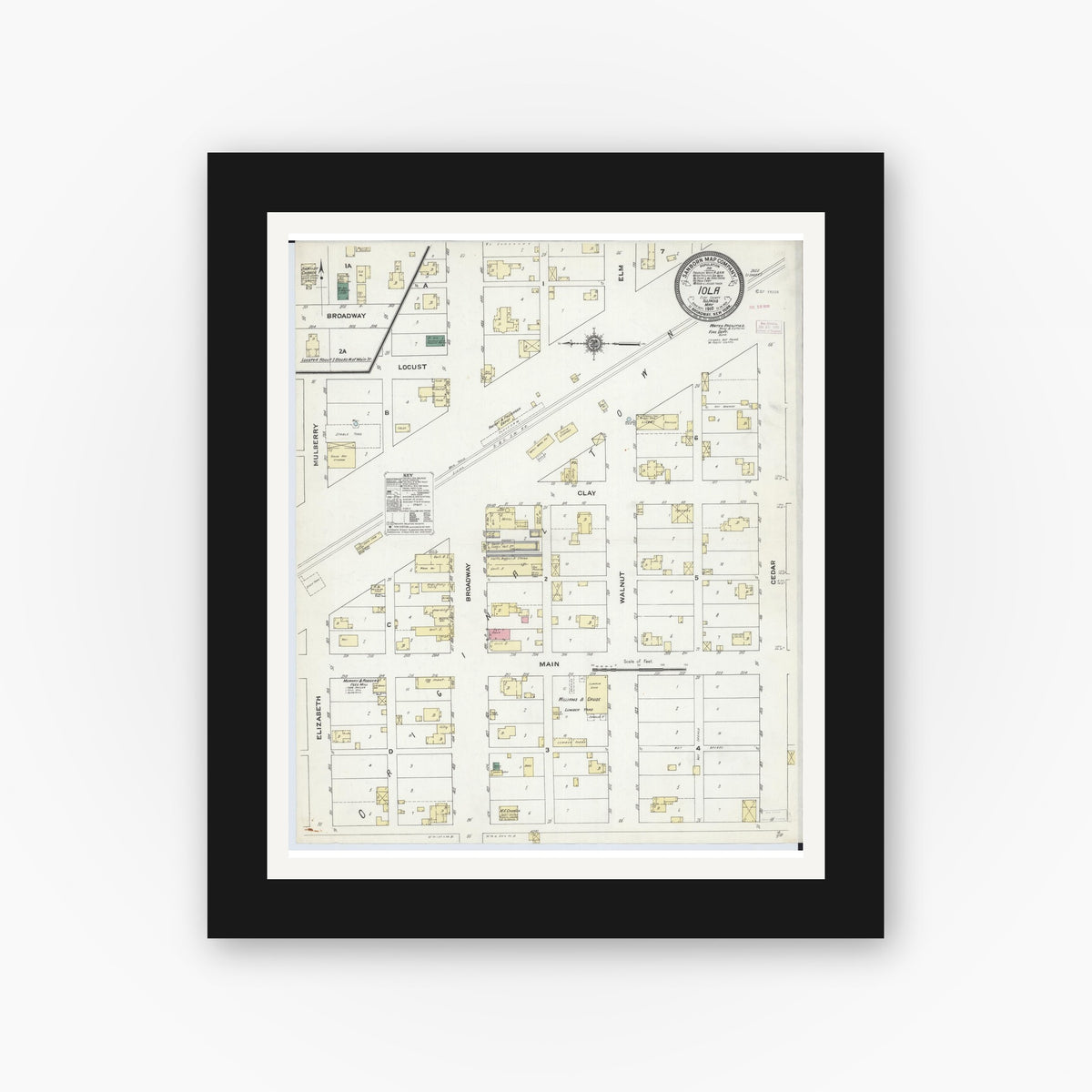 Old map wall art mockup — black gallery frame with white mat — Sanborn Fire Insurance Map from Iola, Clay County, Illinois (1910), Sheet #0001