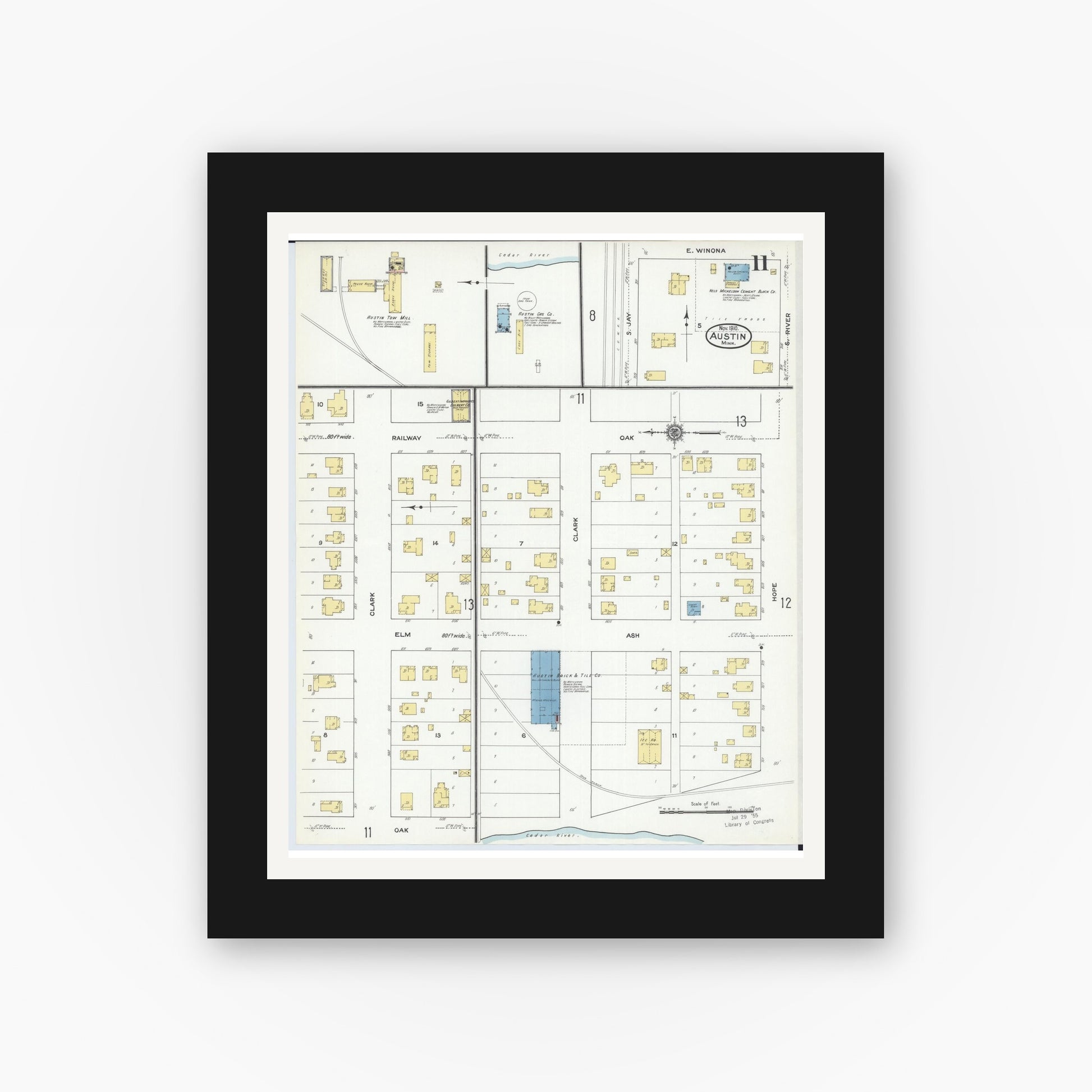 Old map wall art mockup — black gallery frame with white mat — Sanborn Fire Insurance Map from Austin, Mower County, Minnesota (1910), Sheet #0011