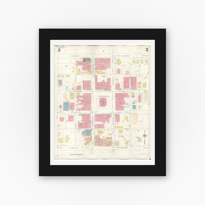 Old map wall art mockup — black gallery frame with white mat — Sanborn Fire Insurance Map from Harrisonville, Cass County, Missouri (1939), Sheet #0002