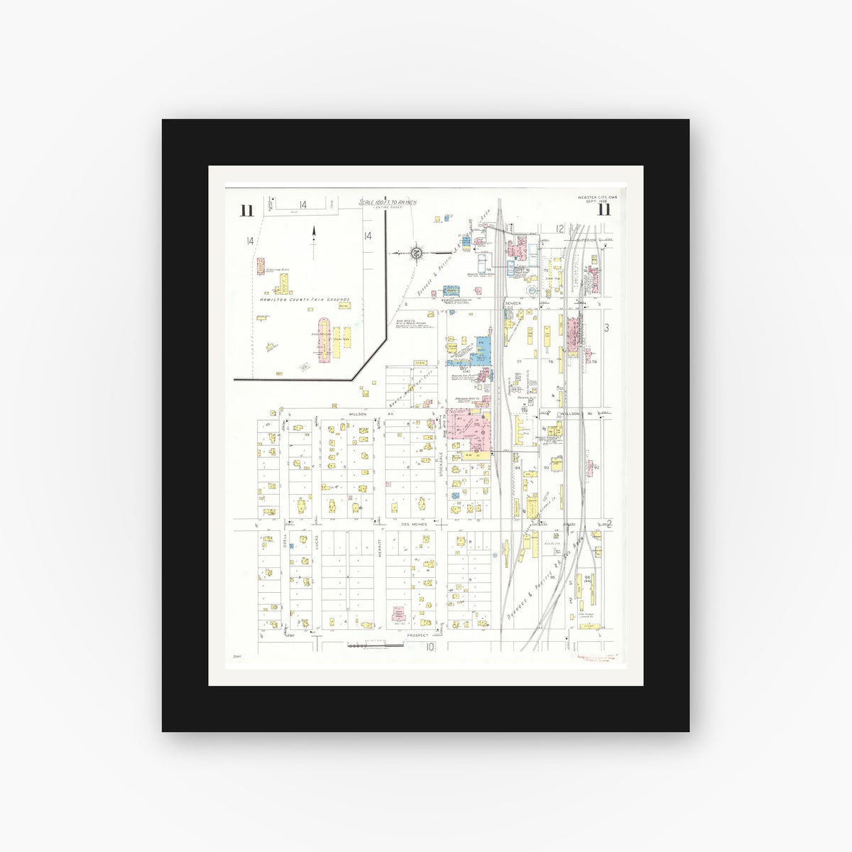Old map wall art mockup — black gallery frame with white mat — Sanborn Fire Insurance Map from Webster City, Hamilton County, Iowa (1938), Sheet #0011