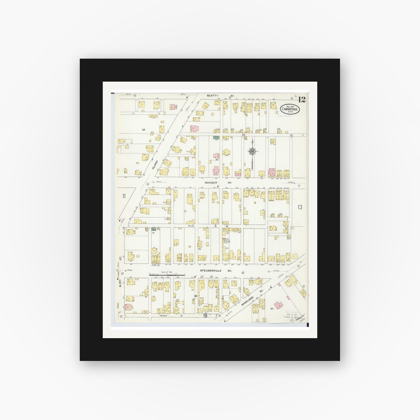 Old map wall art mockup — black gallery frame with white mat — Sanborn Fire Insurance Map from Cambridge, Guernsey County, Ohio (1909), Sheet #0012
