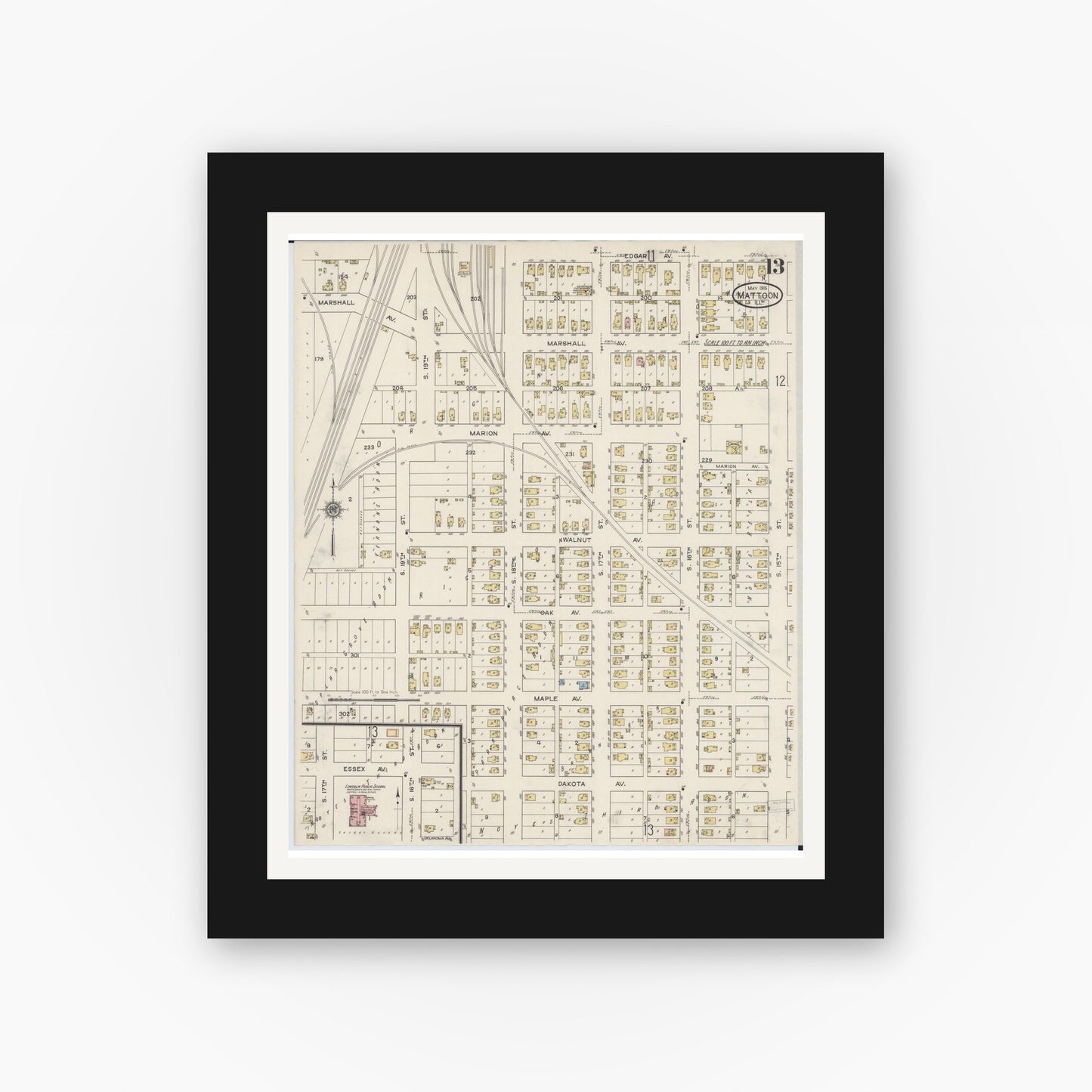 Old map wall art mockup — black gallery frame with white mat — Sanborn Fire Insurance Map from Mattoon, Coles County, Illinois (1915), Sheet #0013
