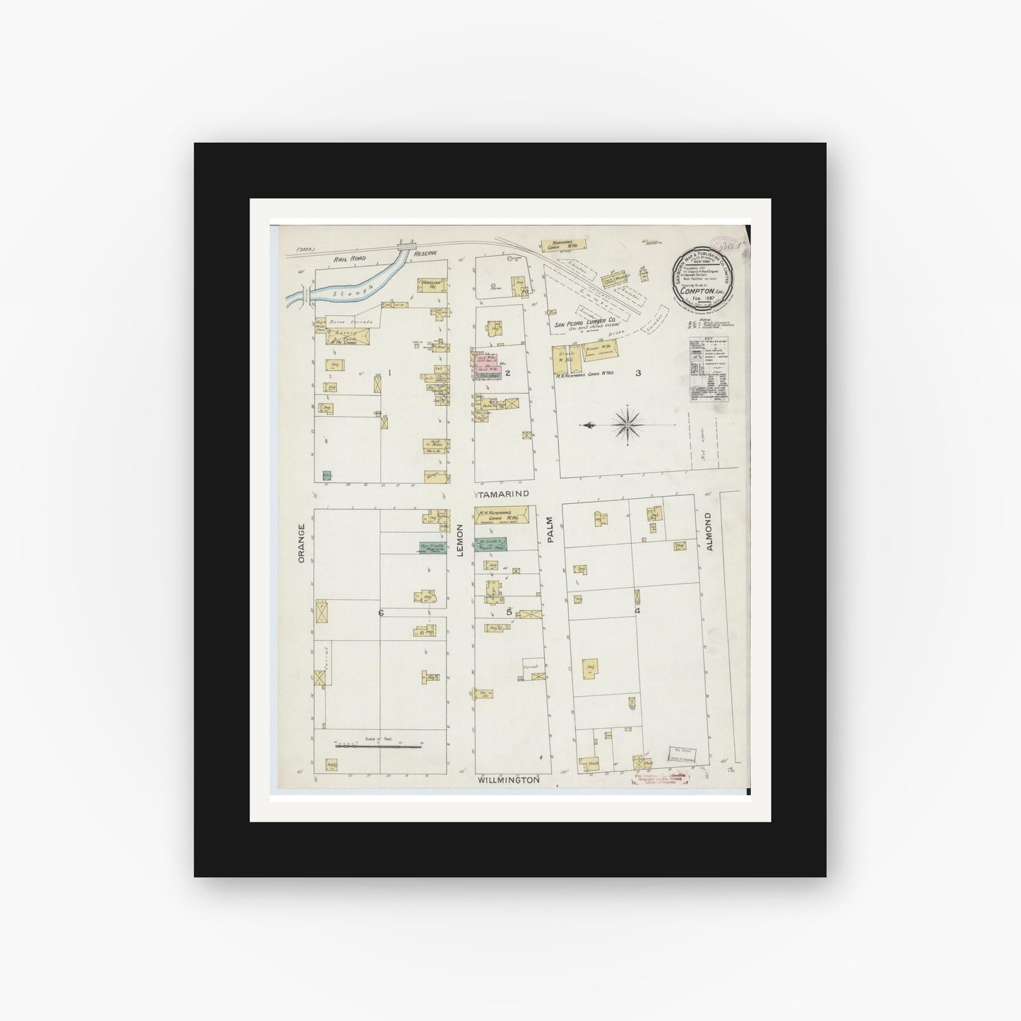 Old map wall art mockup — black gallery frame with white mat — Sanborn Fire Insurance Map from Compton, Los Angeles County, California (1887), Sheet #0001