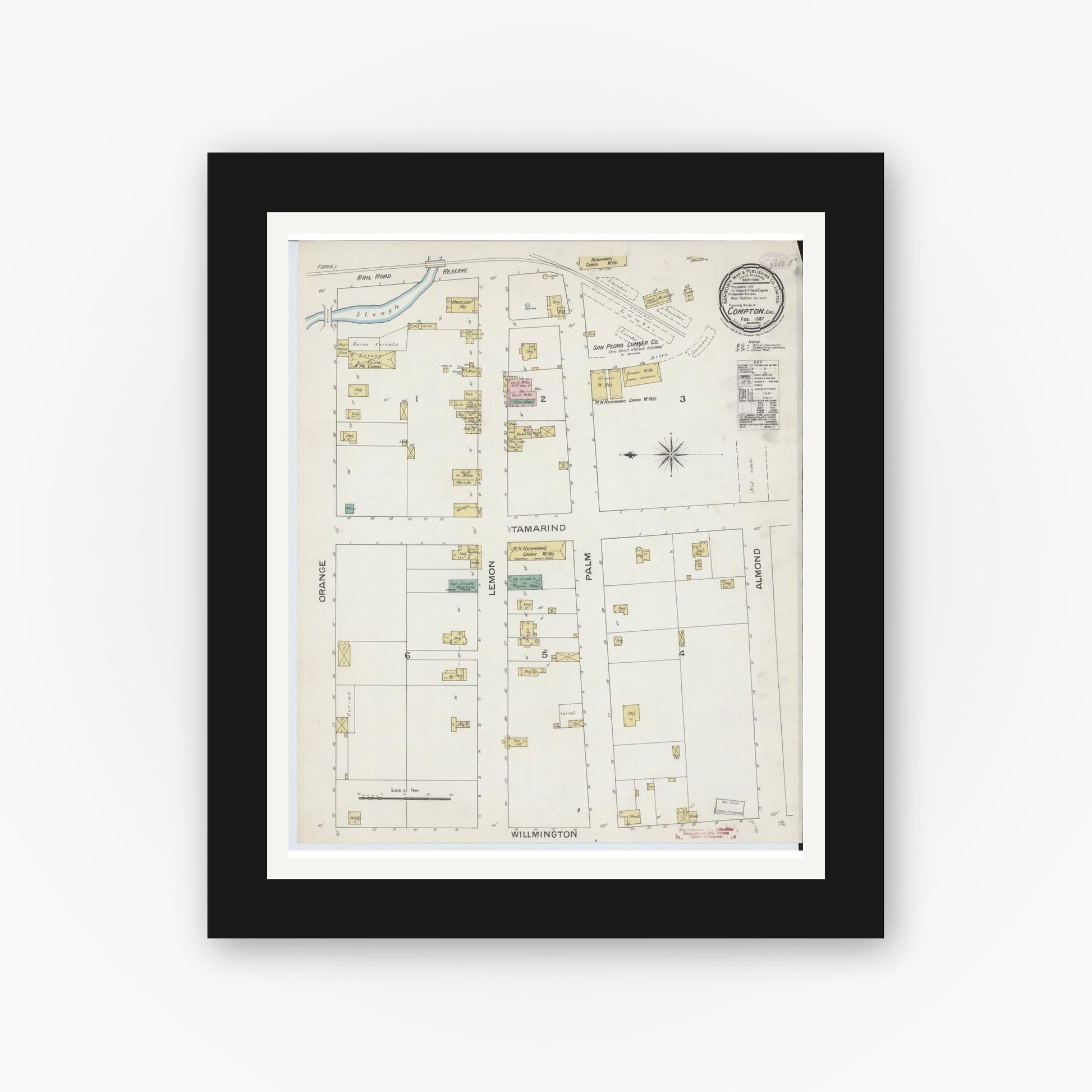 Old map wall art mockup — black gallery frame with white mat — Sanborn Fire Insurance Map from Compton, Los Angeles County, California (1887), Sheet #0001