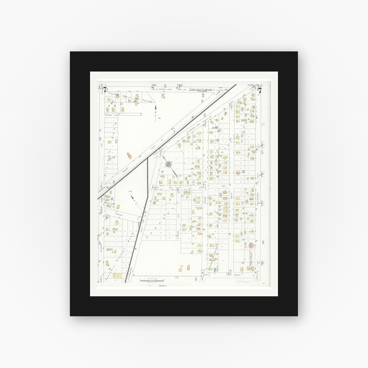 Old map wall art mockup — black gallery frame with white mat — Sanborn Fire Insurance Map from Crystal Lake, McHenry County, Illinois (1936), Sheet #0007