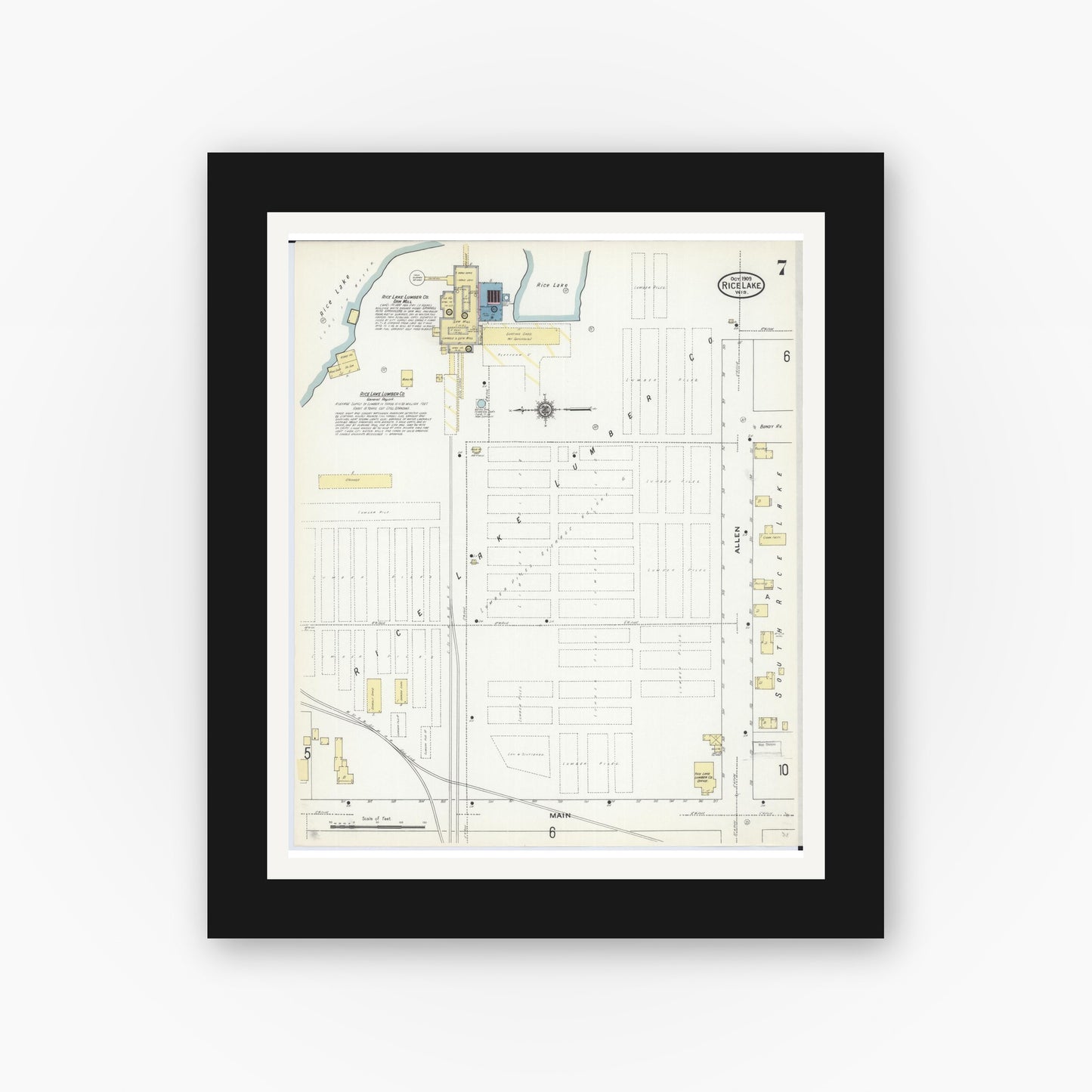 Old map wall art mockup — black gallery frame with white mat — Sanborn Fire Insurance Map from Rice Lake, Barron County, Wisconsin (1909), Sheet #0007