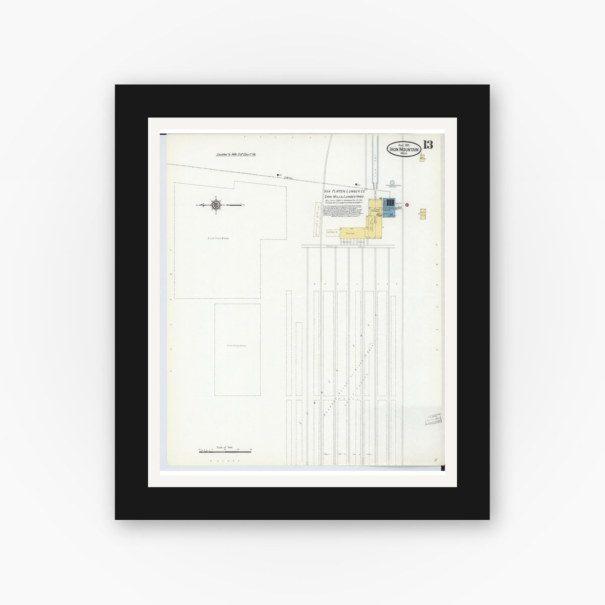 Old map wall art mockup — black gallery frame with white mat — Sanborn Fire Insurance Map from Iron Mountain, Dickinson County, Michigan (1911), Sheet #0013