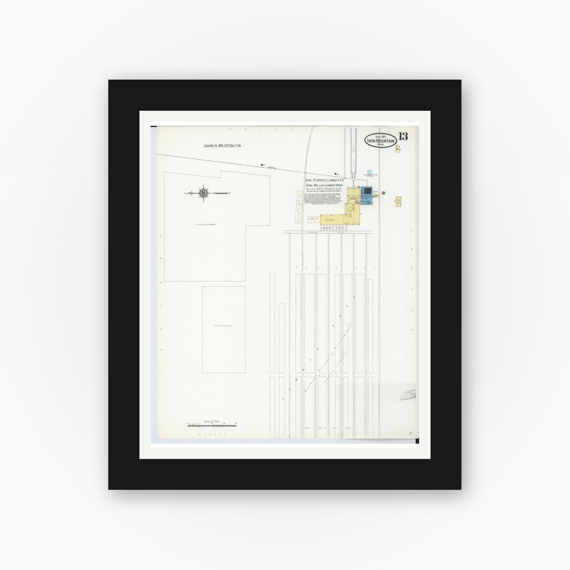 Old map wall art mockup — black gallery frame with white mat — Sanborn Fire Insurance Map from Iron Mountain, Dickinson County, Michigan (1911), Sheet #0013
