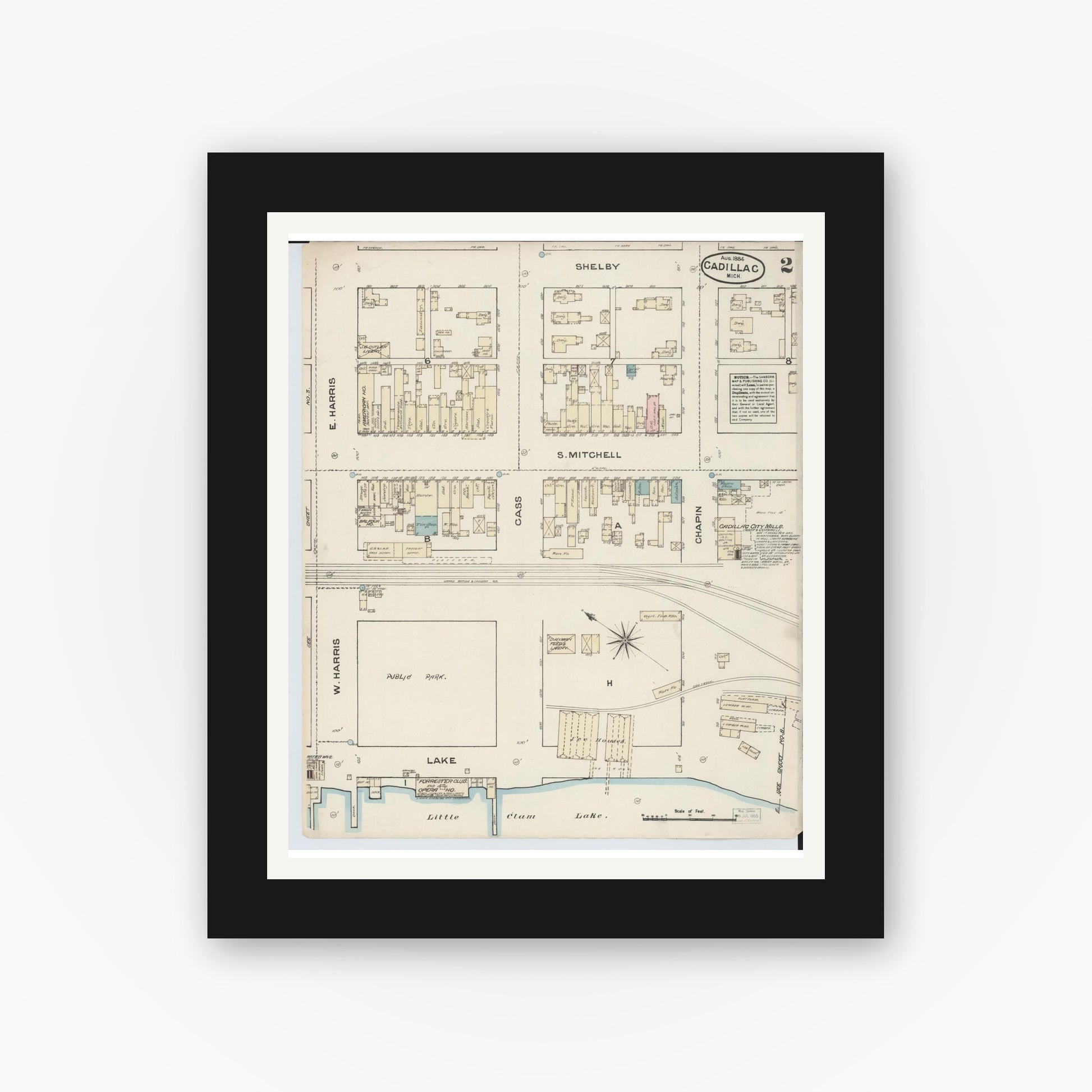 Old map wall art mockup — black gallery frame with white mat — Sanborn Fire Insurance Map from Cadillac, Wexford County, Michigan (1884), Sheet #0002