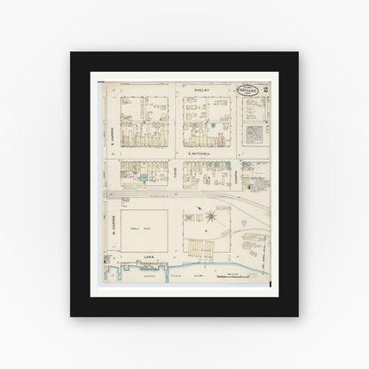 Old map wall art mockup — black gallery frame with white mat — Sanborn Fire Insurance Map from Cadillac, Wexford County, Michigan (1884), Sheet #0002