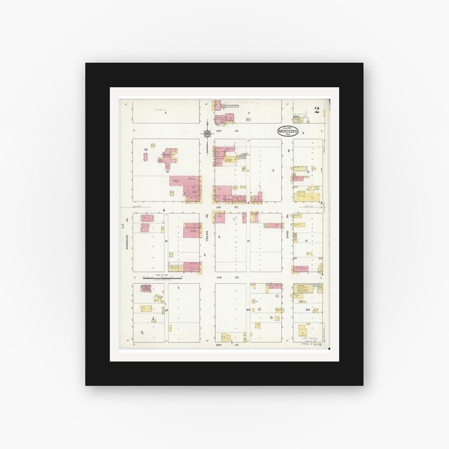 Old map wall art mockup — black gallery frame with white mat — Sanborn Fire Insurance Map from Mercedes, Hidalgo County, Texas (1917), Sheet #0002