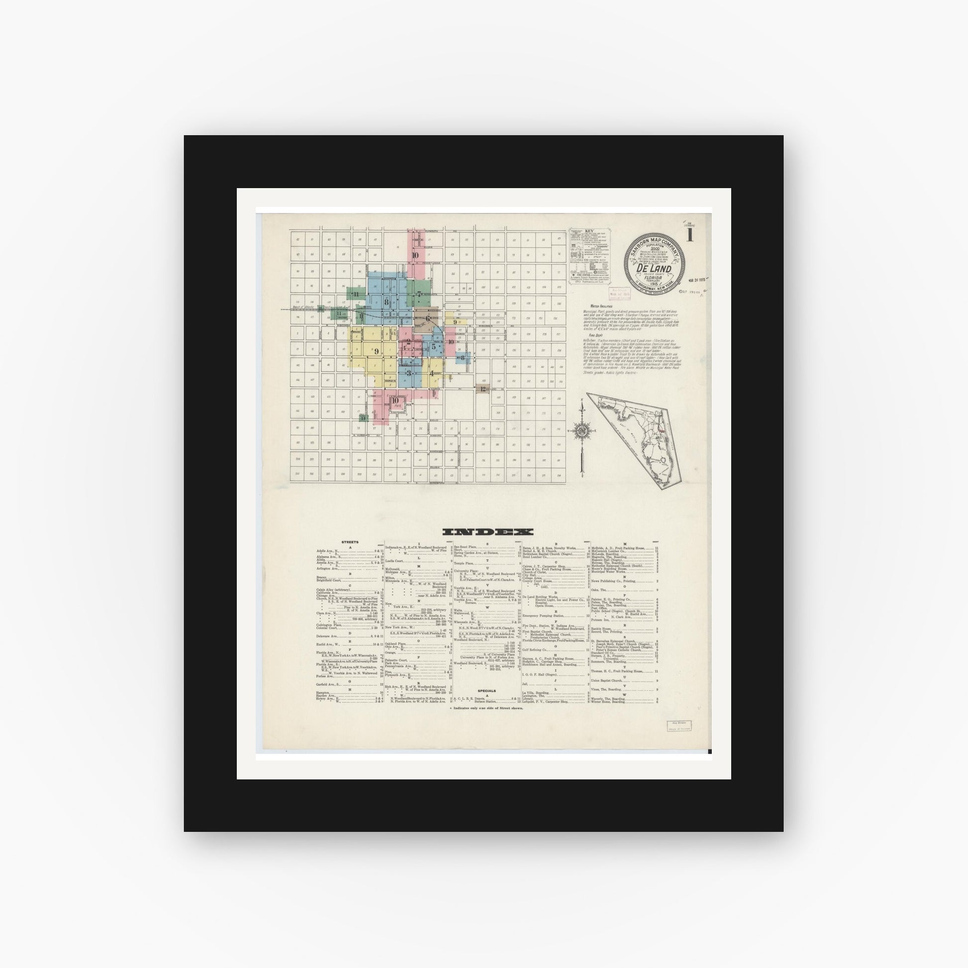 Old map wall art mockup — black gallery frame with white mat — Sanborn Fire Insurance Map from De Land, Volusia County, Florida (1915) - Complete Map Set