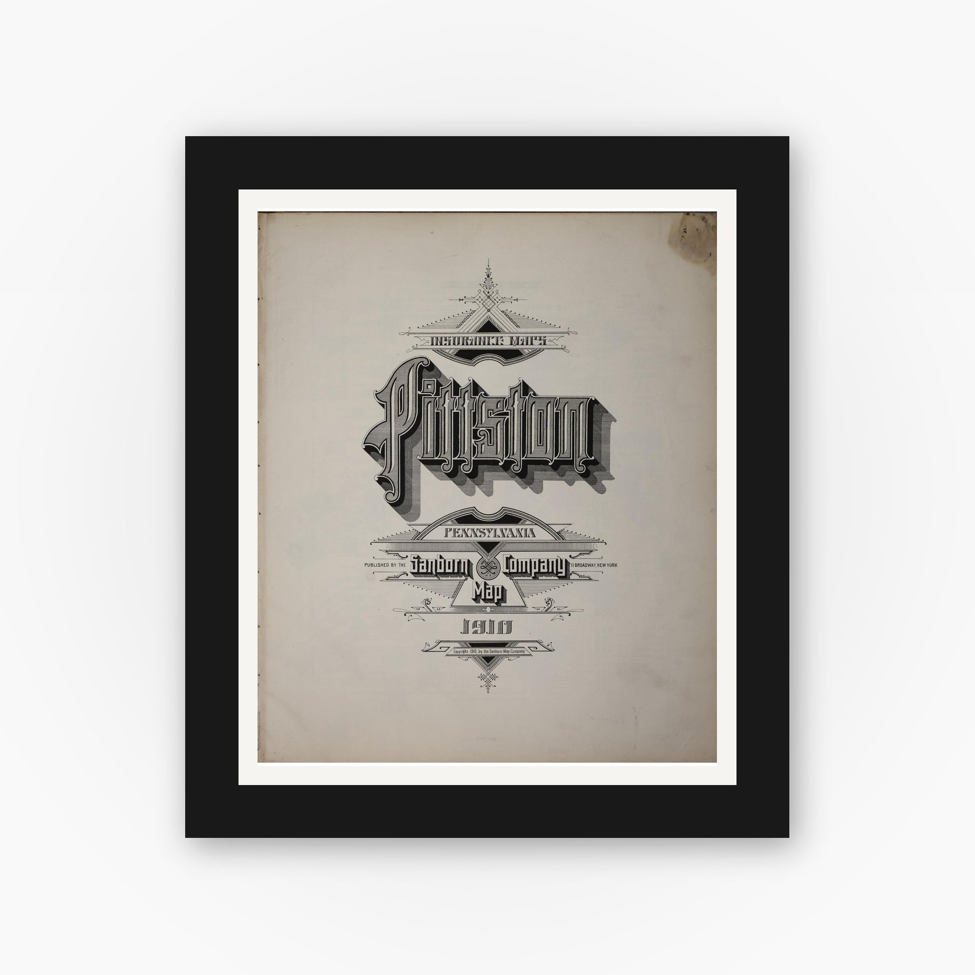 Old map wall art mockup — black gallery frame with white mat — Sanborn Fire Insurance Map from Pittston, Luzerne County, Pennsylvania (1910), Sheet #0001
