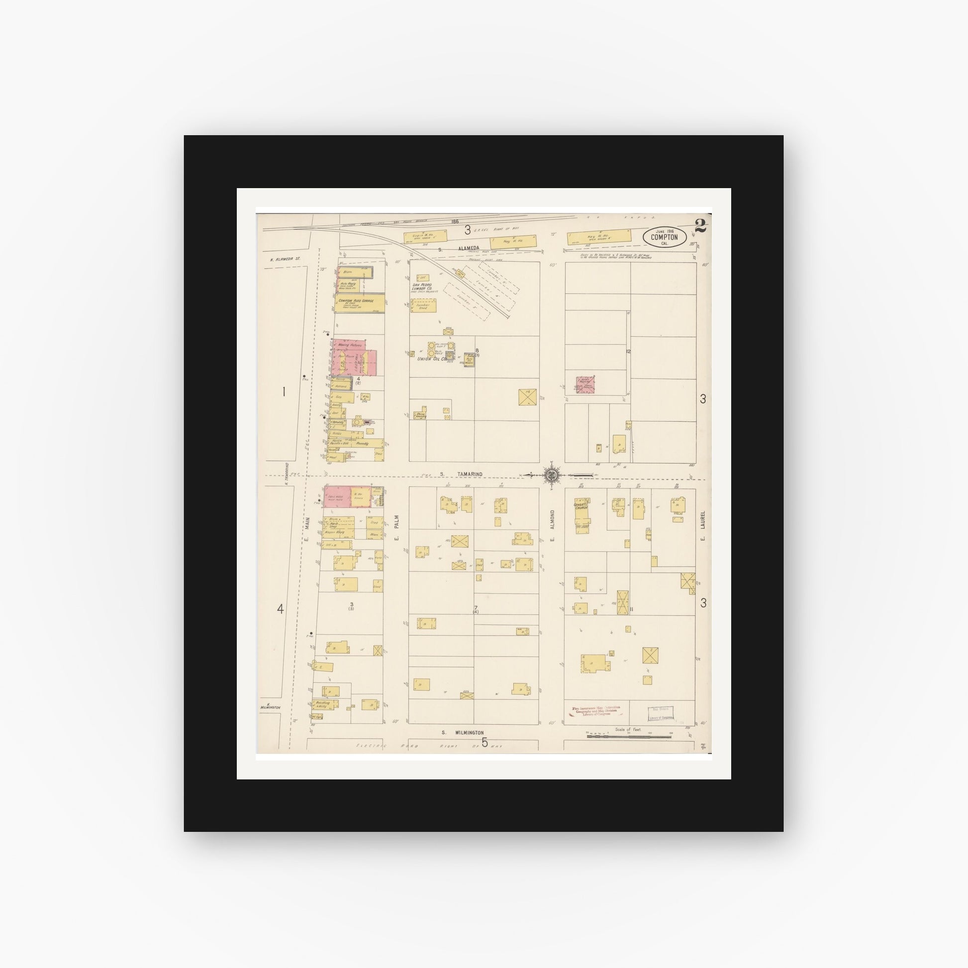 Old map wall art mockup — black gallery frame with white mat — Sanborn Fire Insurance Map from Compton, Los Angeles County, California (1916), Sheet #0002