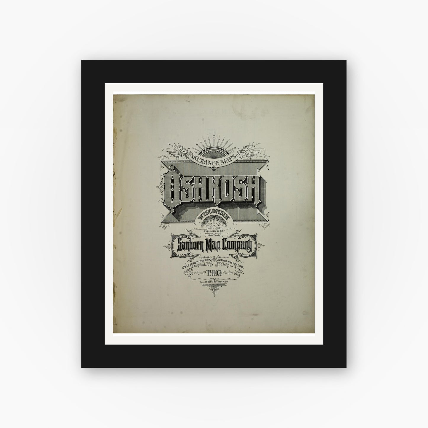 Old map wall art mockup — black gallery frame with white mat — Sanborn Fire Insurance Map from Oshkosh, Winnebago County, Wisconsin (1903), Sheet #0001