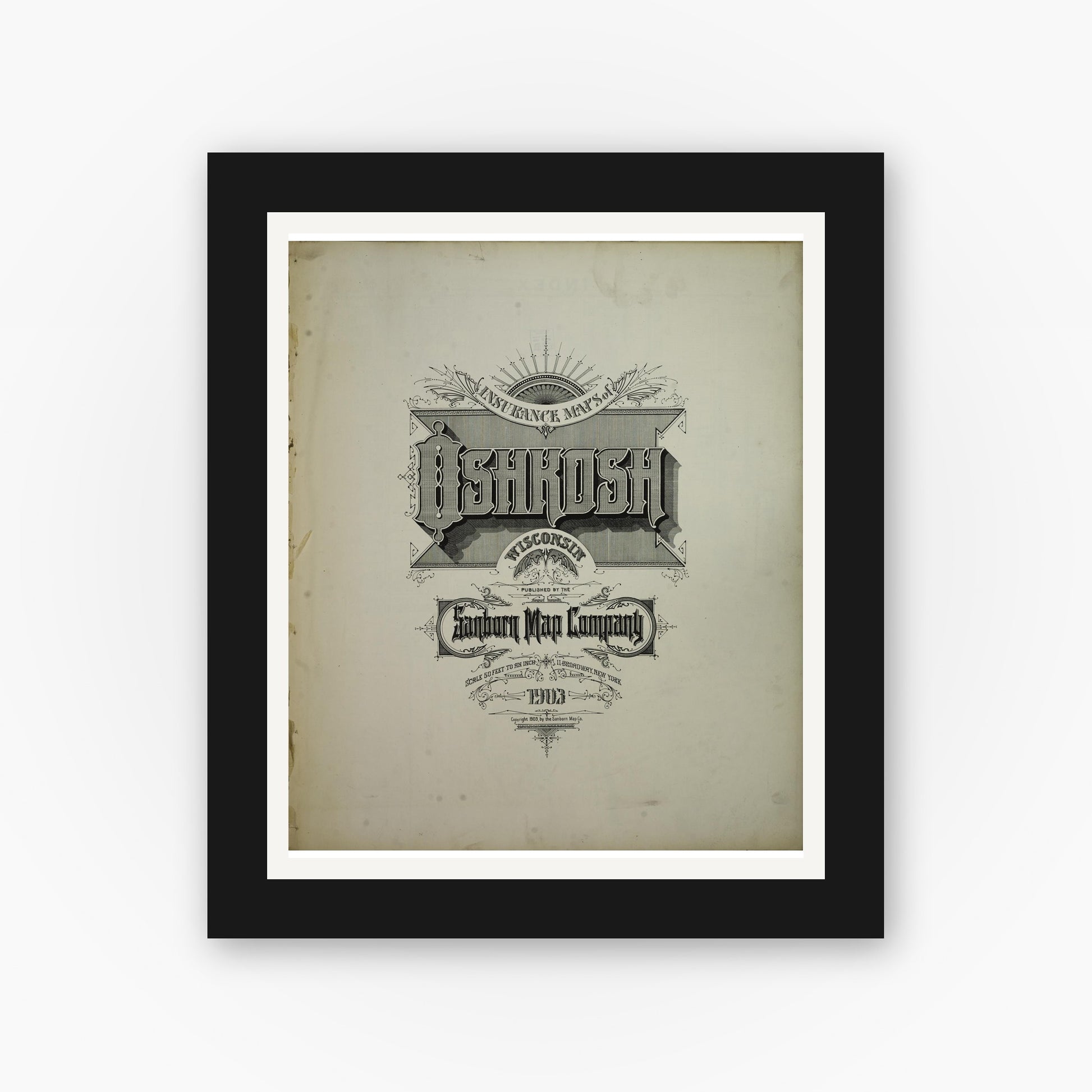 Old map wall art mockup — black gallery frame with white mat — Sanborn Fire Insurance Map from Oshkosh, Winnebago County, Wisconsin (1903), Sheet #0001