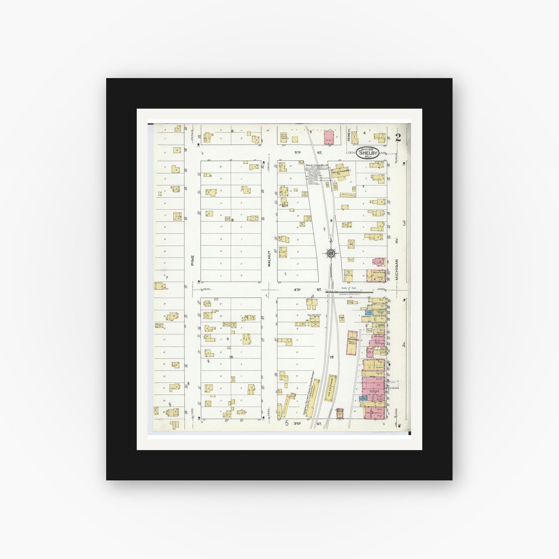 Old map wall art mockup — black gallery frame with white mat — Sanborn Fire Insurance Map from Shelby, Oceana County, Michigan (1920), Sheet #0002