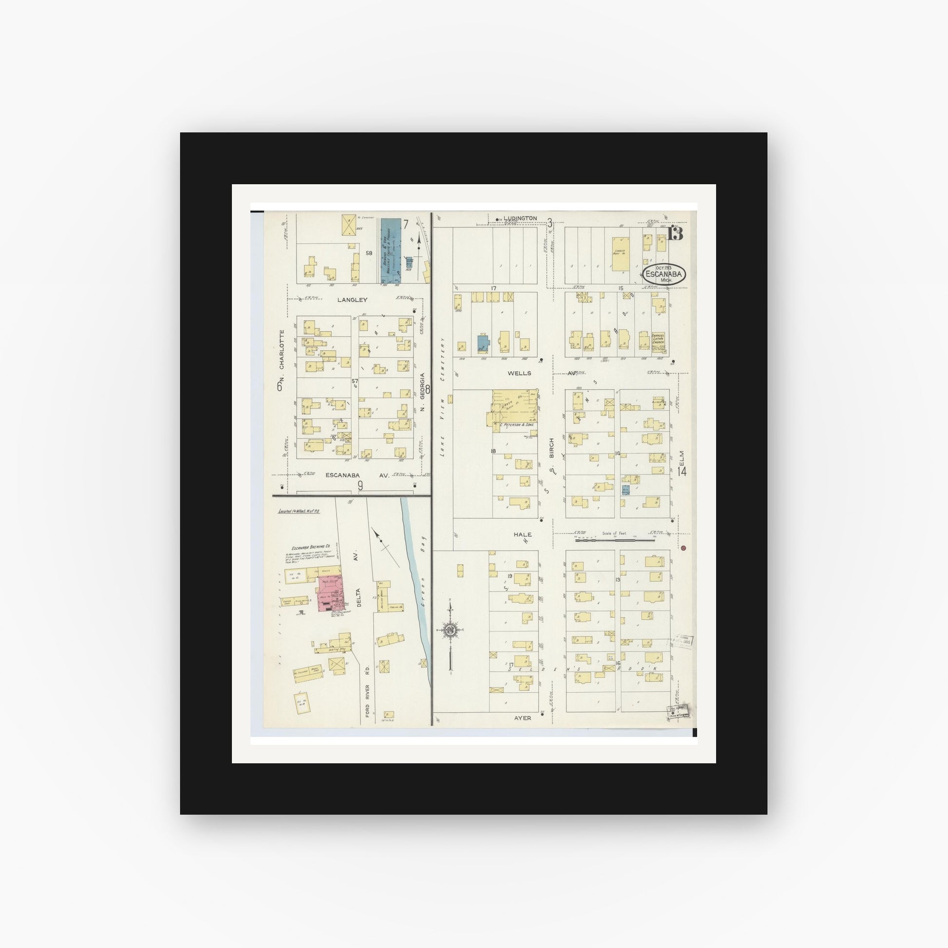 Old map wall art mockup — black gallery frame with white mat — Sanborn Fire Insurance Map from Escanaba, Delta County, Michigan (1913), Sheet #0013