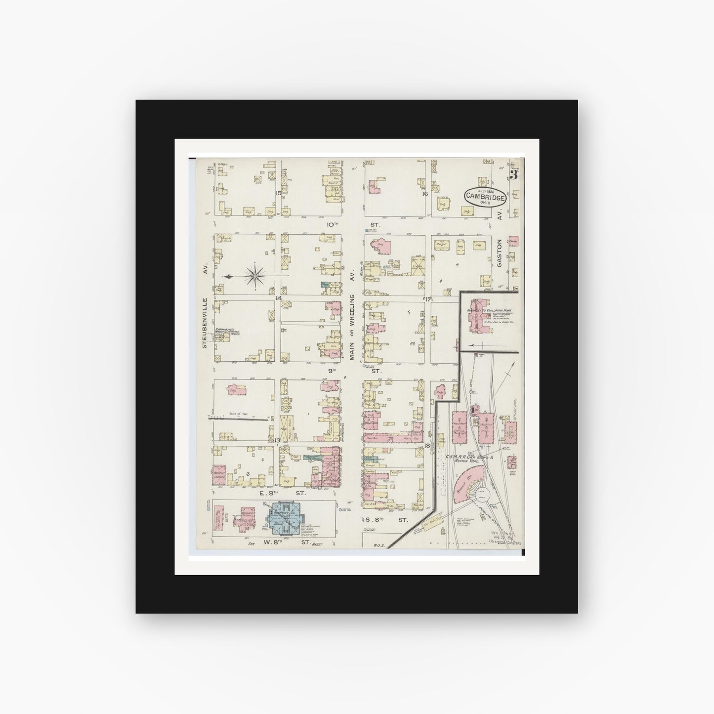 Old map wall art mockup — black gallery frame with white mat — Sanborn Fire Insurance Map from Cambridge, Guernsey County, Ohio (1886), Sheet #0003