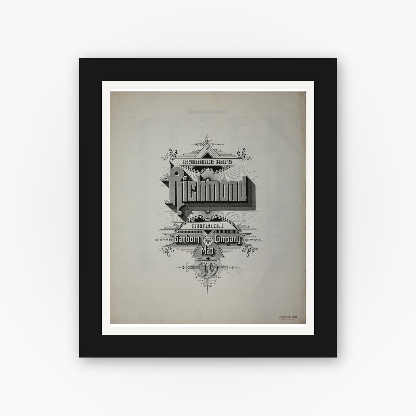 Old map wall art mockup — black gallery frame with white mat — Sanborn Fire Insurance Map from Richmond, Wayne County, Indiana (1909), Sheet #0001