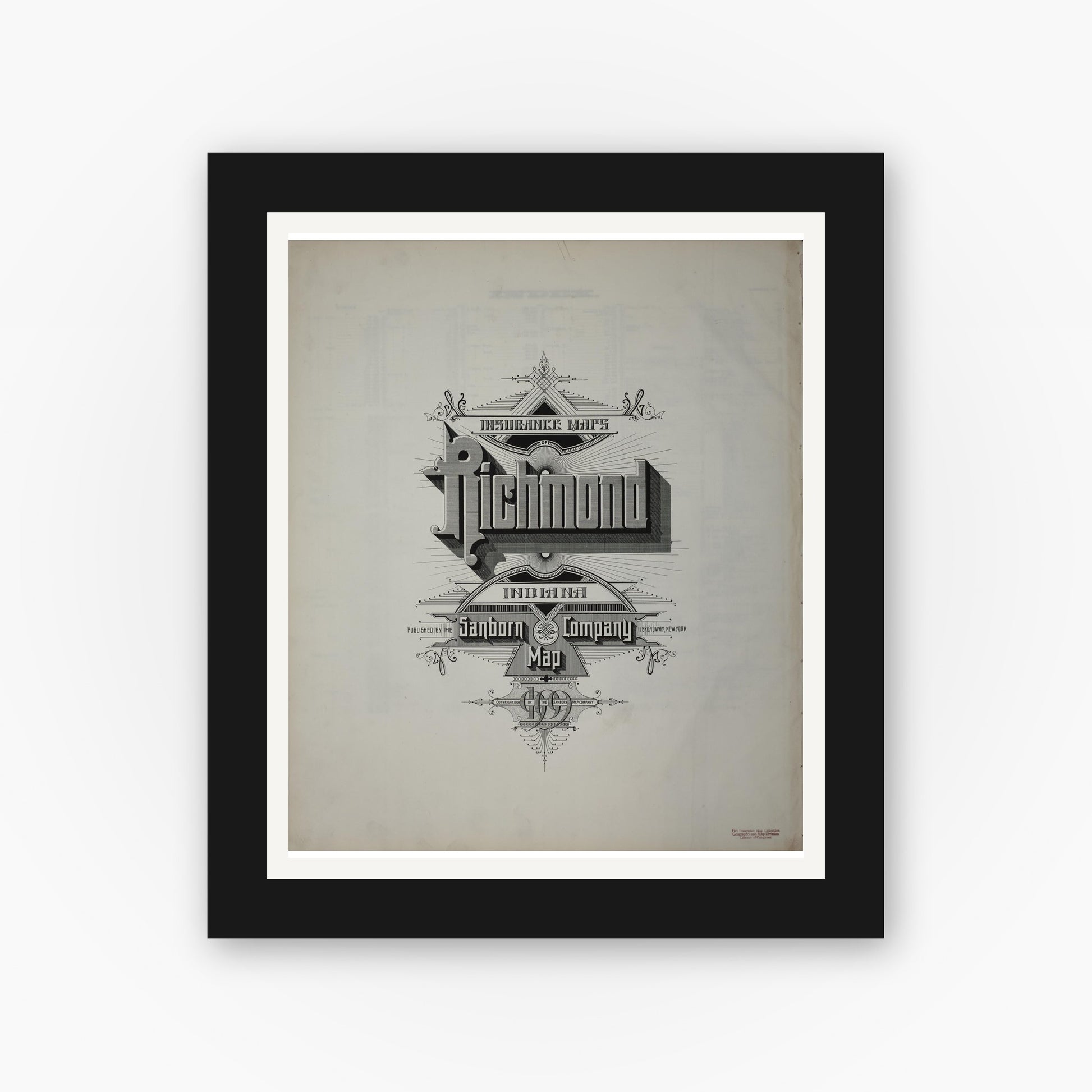 Old map wall art mockup — black gallery frame with white mat — Sanborn Fire Insurance Map from Richmond, Wayne County, Indiana (1909), Sheet #0001