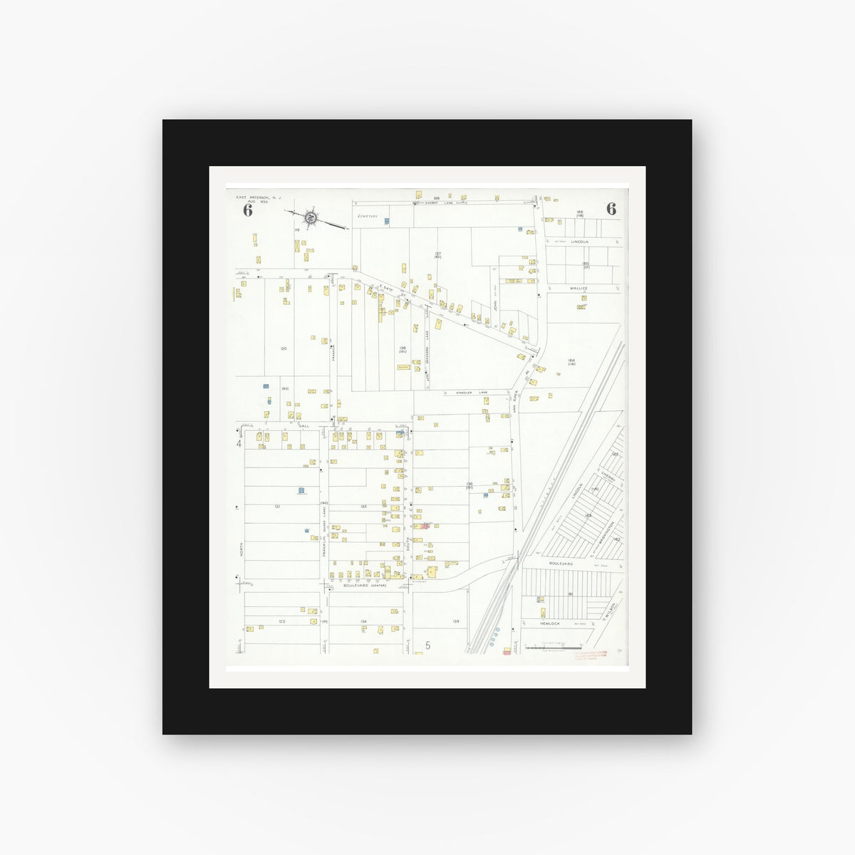 Old map wall art mockup — black gallery frame with white mat — Sanborn Fire Insurance Map from East Paterson, Bergen County, New Jersey (1932), Sheet #0006