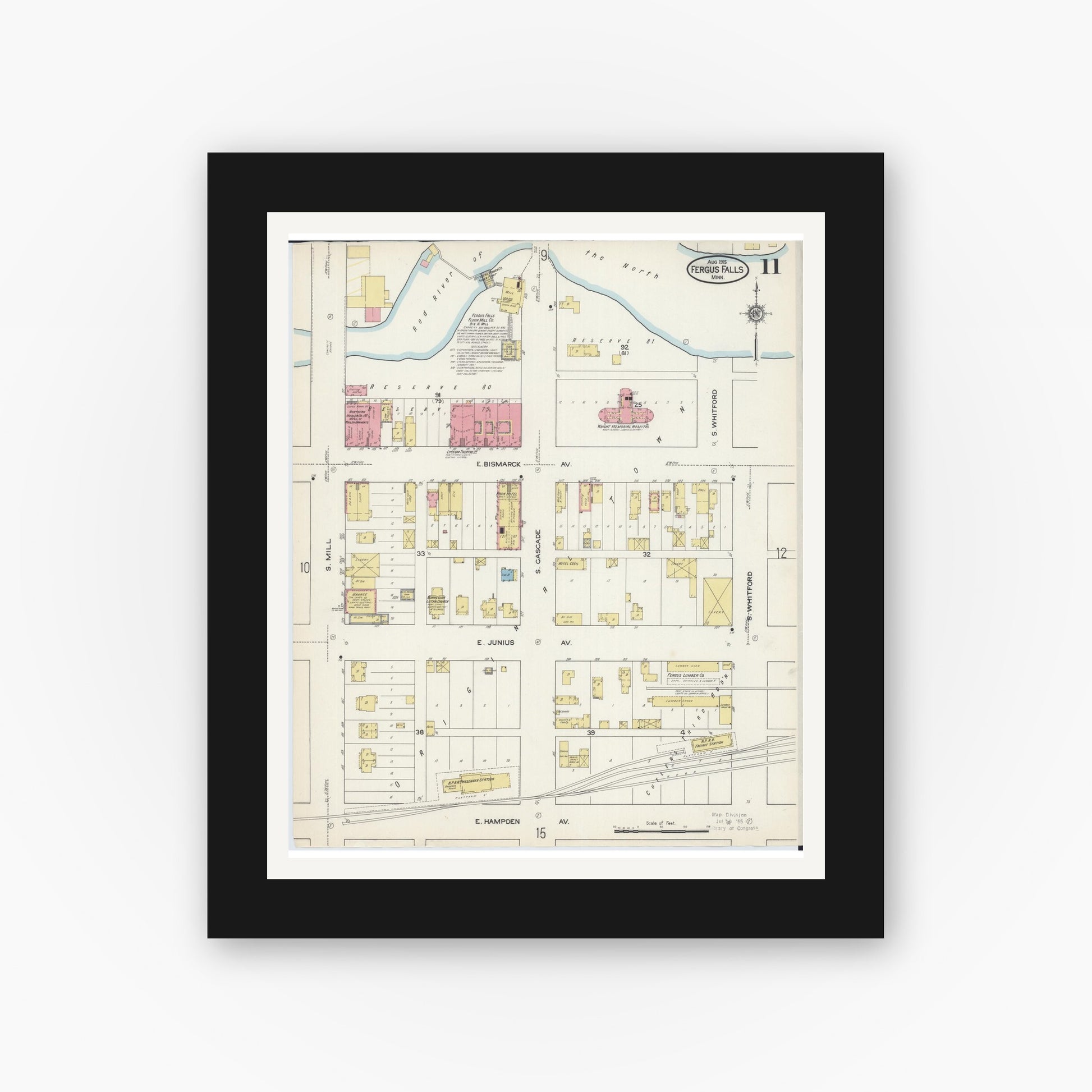 Old map wall art mockup — black gallery frame with white mat — Sanborn Fire Insurance Map from Fergus Falls, Otter Tail County, Minnesota (1915), Sheet #0011