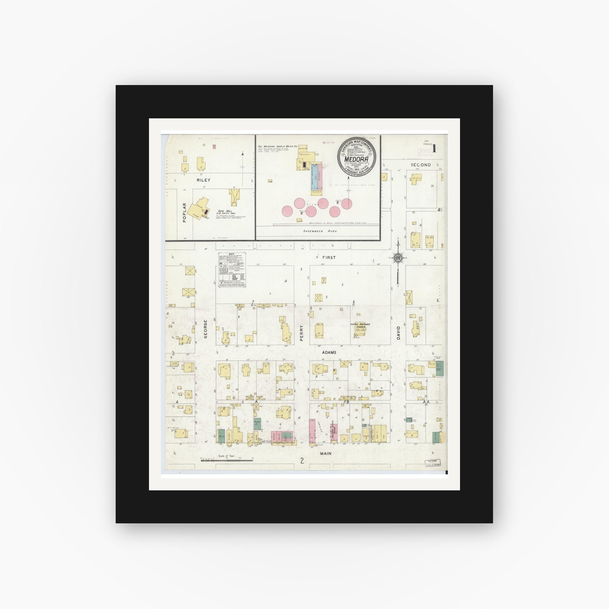 Old map wall art mockup — black gallery frame with white mat — Sanborn Fire Insurance Map from Medora, Jackson County, Indiana (1910) - Complete Map Set