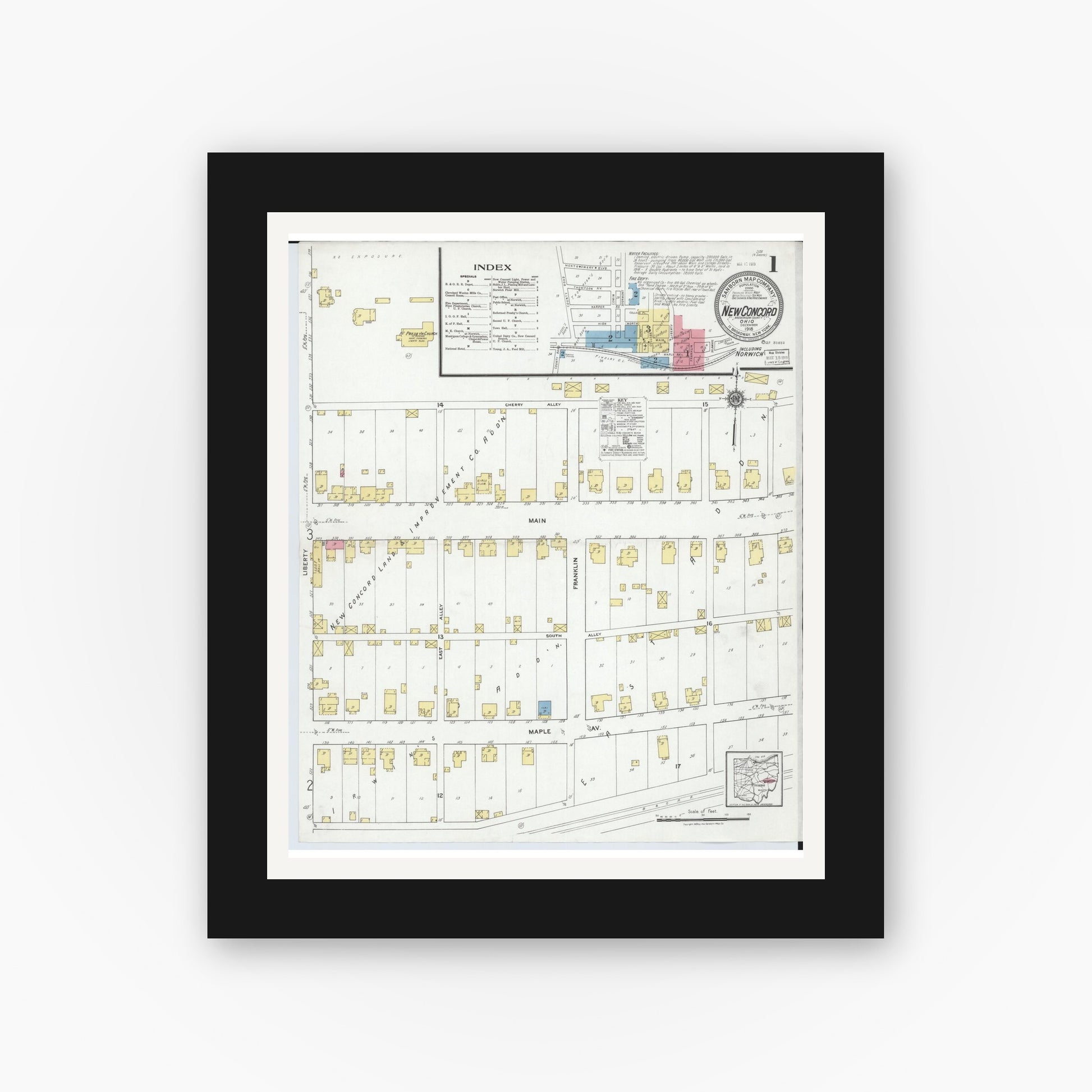 Old map wall art mockup — black gallery frame with white mat — Sanborn Fire Insurance Map from New Concord, Muskingum County, Ohio (1918), Sheet #0001