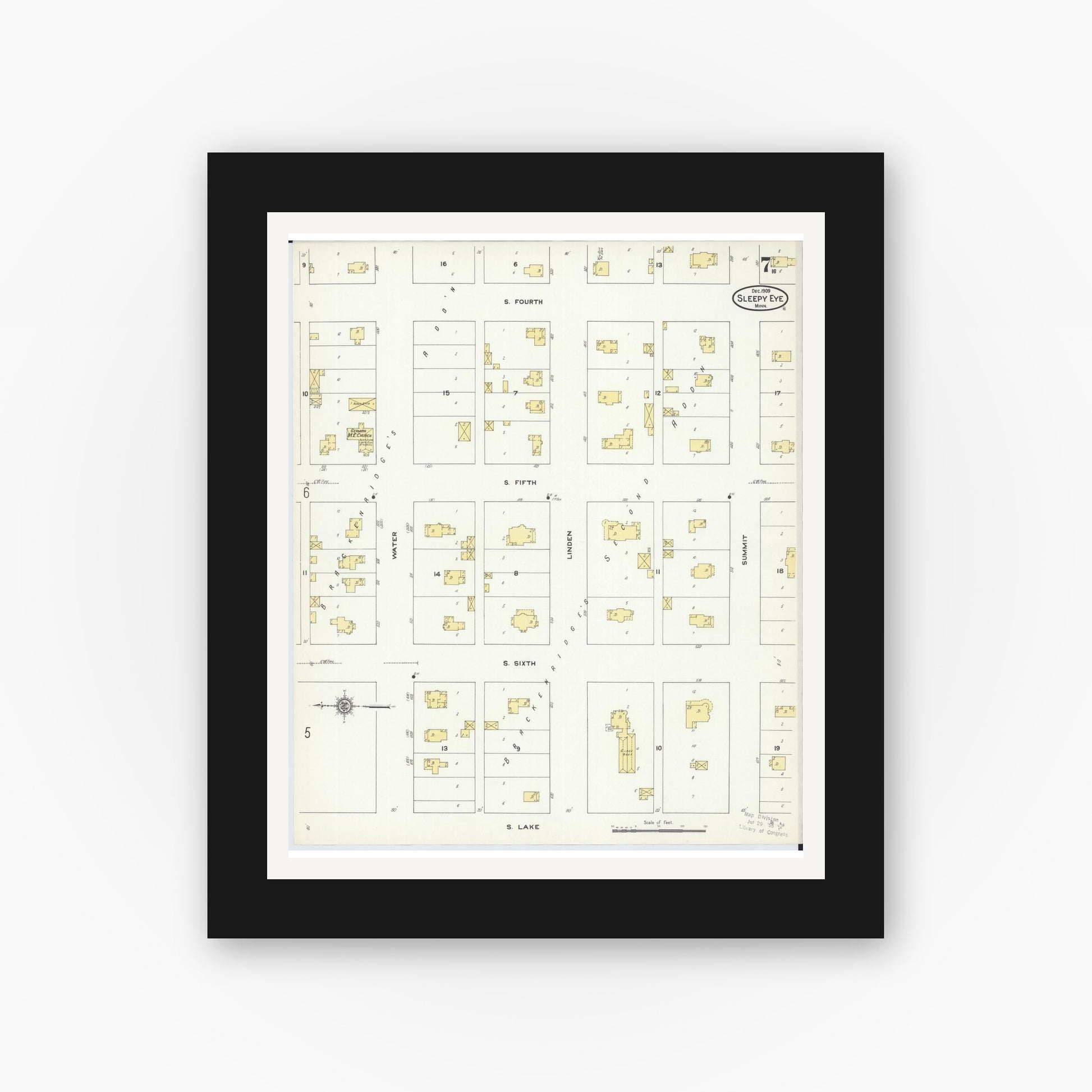 Old map wall art mockup — black gallery frame with white mat — Sanborn Fire Insurance Map from Sleepy Eye, Brown County, Minnesota (1909), Sheet #0007