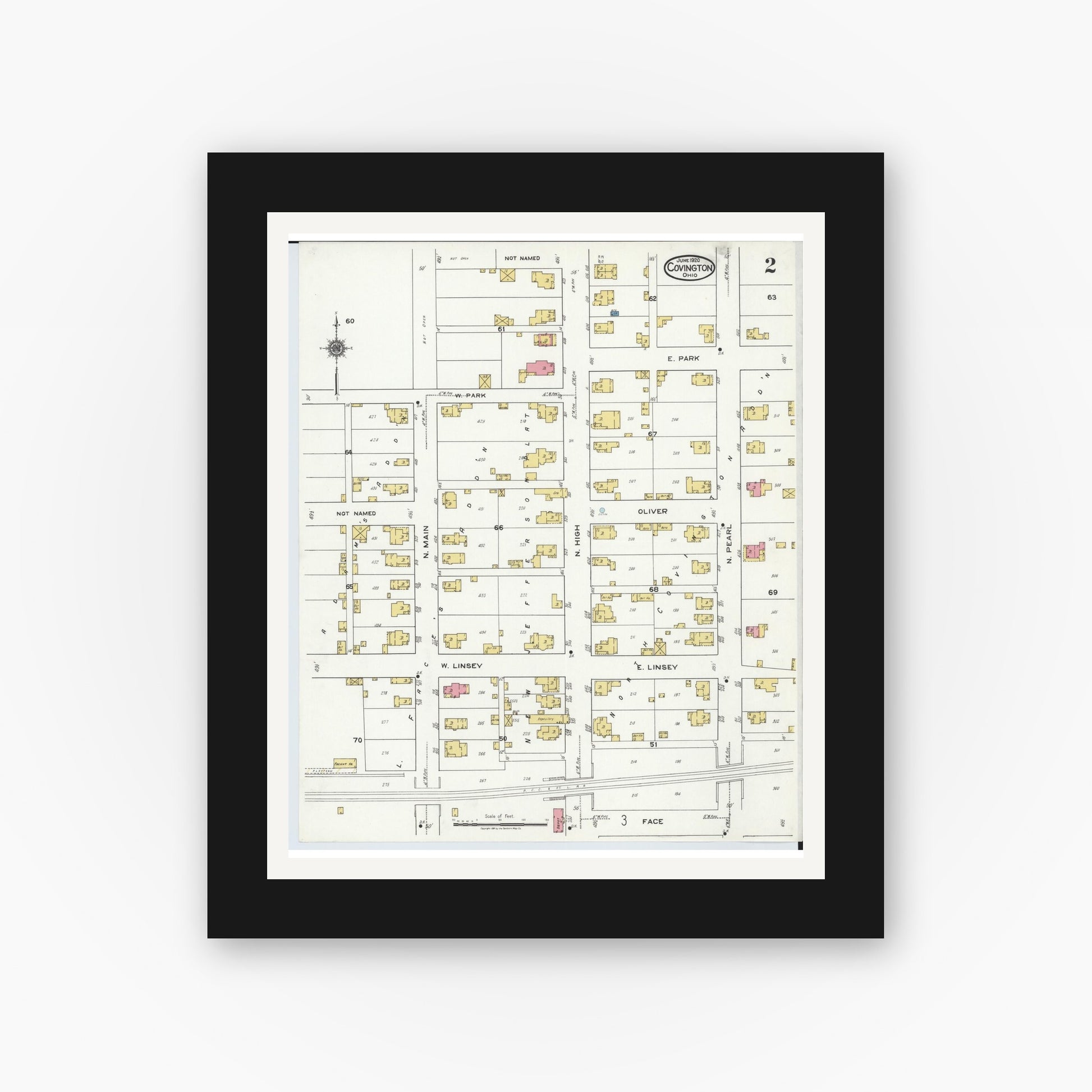 Old map wall art mockup — black gallery frame with white mat — Sanborn Fire Insurance Map from Covington, Miami County, Ohio (1920), Sheet #0002