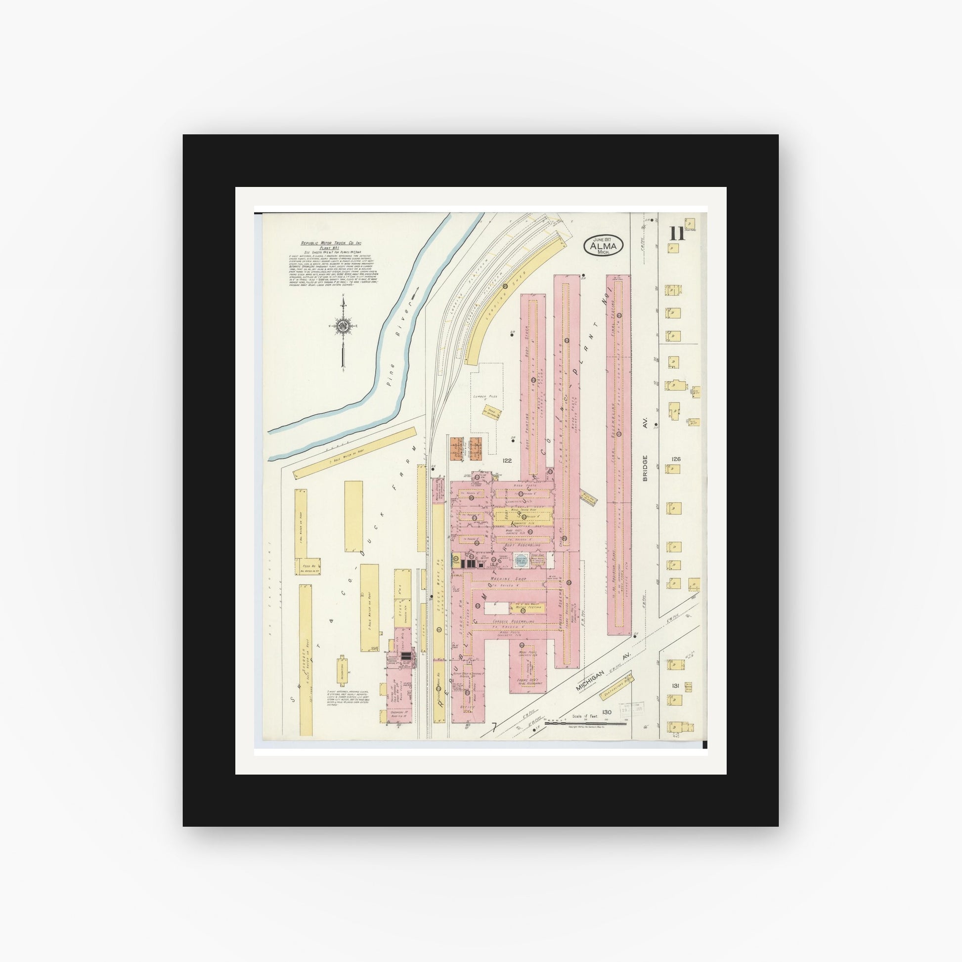 Old map wall art mockup — black gallery frame with white mat — Sanborn Fire Insurance Map from Alma, Gratiot County, Michigan (1917), Sheet #0011