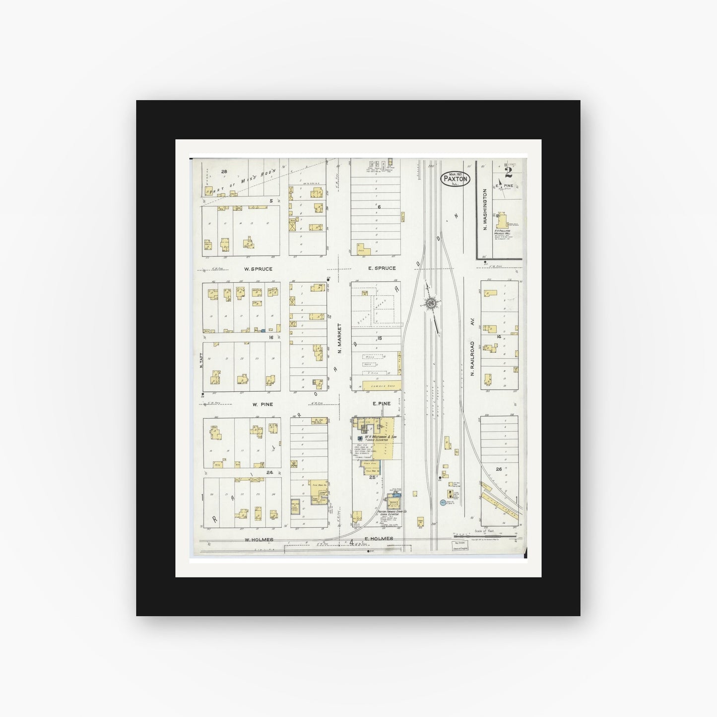 Old map wall art mockup — black gallery frame with white mat — Sanborn Fire Insurance Map from Paxton, Ford County, Illinois (1921), Sheet #0002