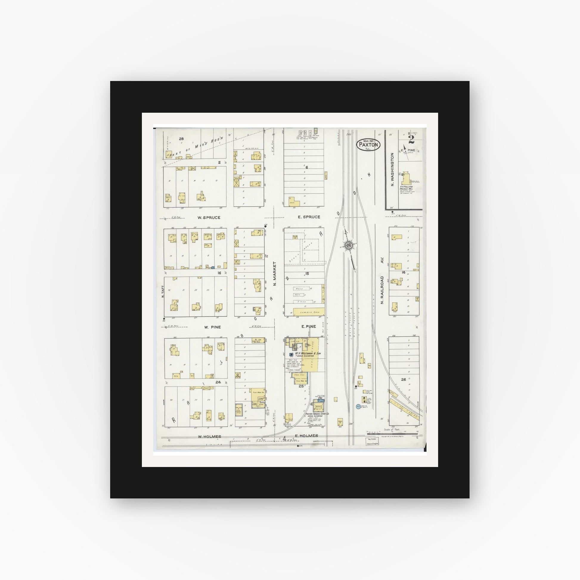 Old map wall art mockup — black gallery frame with white mat — Sanborn Fire Insurance Map from Paxton, Ford County, Illinois (1921), Sheet #0002