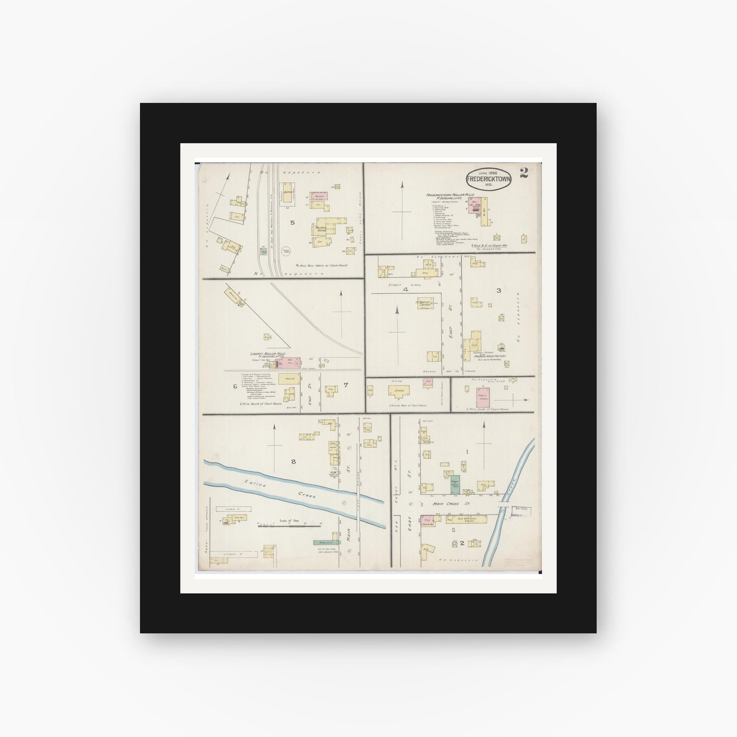 Old map wall art mockup — black gallery frame with white mat — Sanborn Fire Insurance Map from Fredericktown, Madison County, Missouri (1886), Sheet #0002