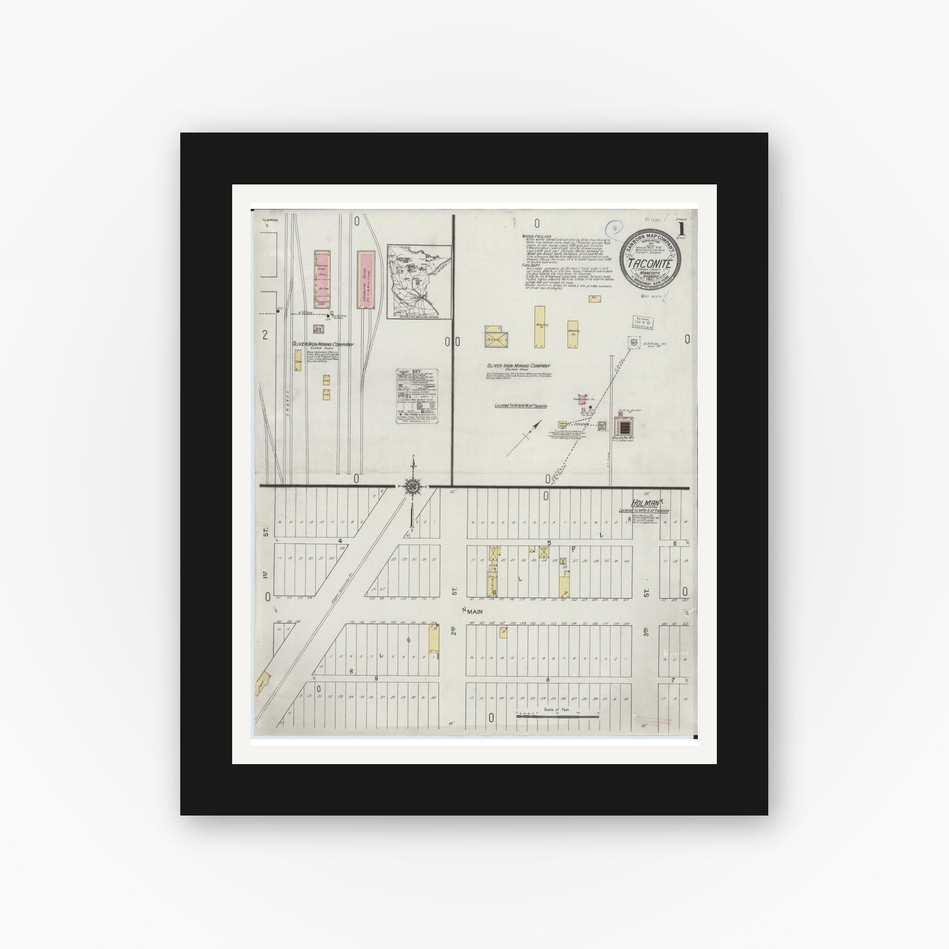 Old map wall art mockup — black gallery frame with white mat — Sanborn Fire Insurance Map from Taconite, Ltasca County, Minnesota (1921), Sheet #0001
