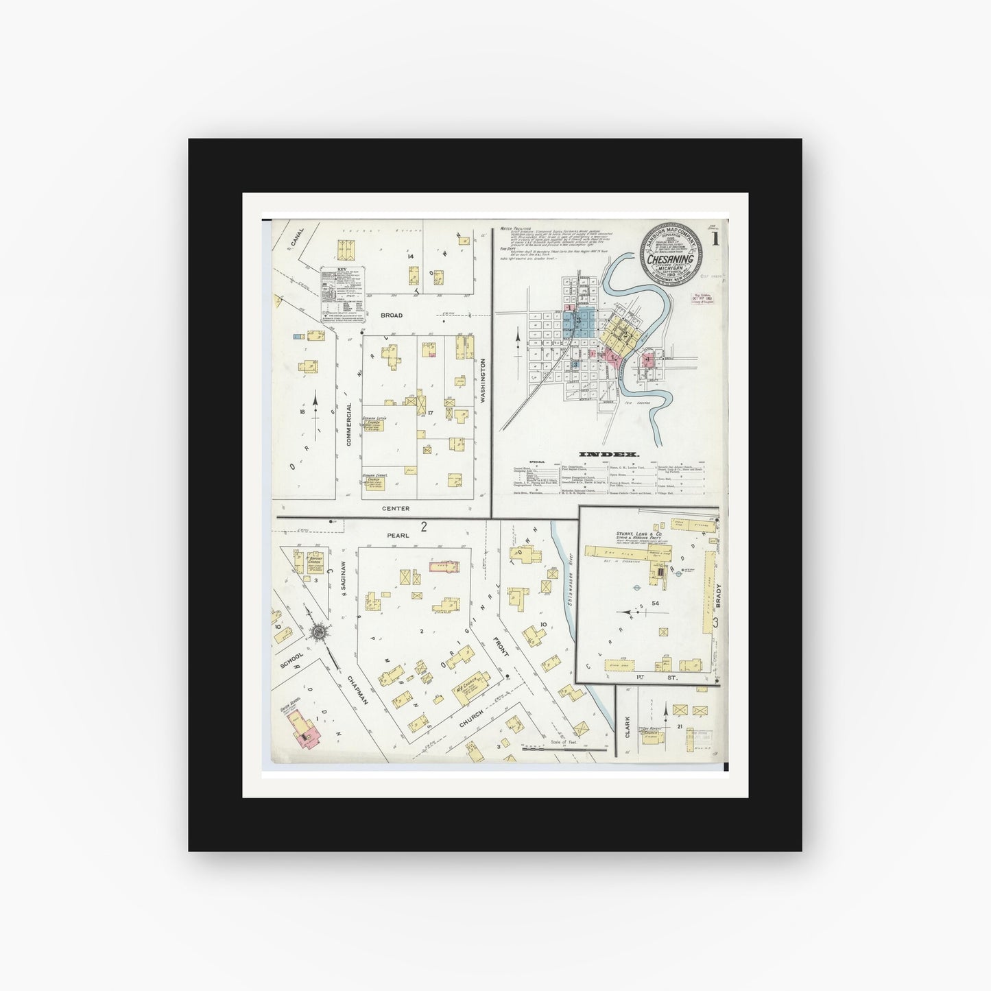 Old map wall art mockup — black gallery frame with white mat — Sanborn Fire Insurance Map from Chesaning, Saginaw County, Michigan (1910), Sheet #0001