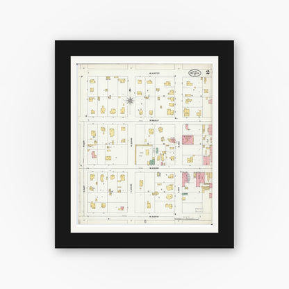Old map wall art mockup — black gallery frame with white mat — Sanborn Fire Insurance Map from Nevada, Vernon County, Missouri (1900), Sheet #0002