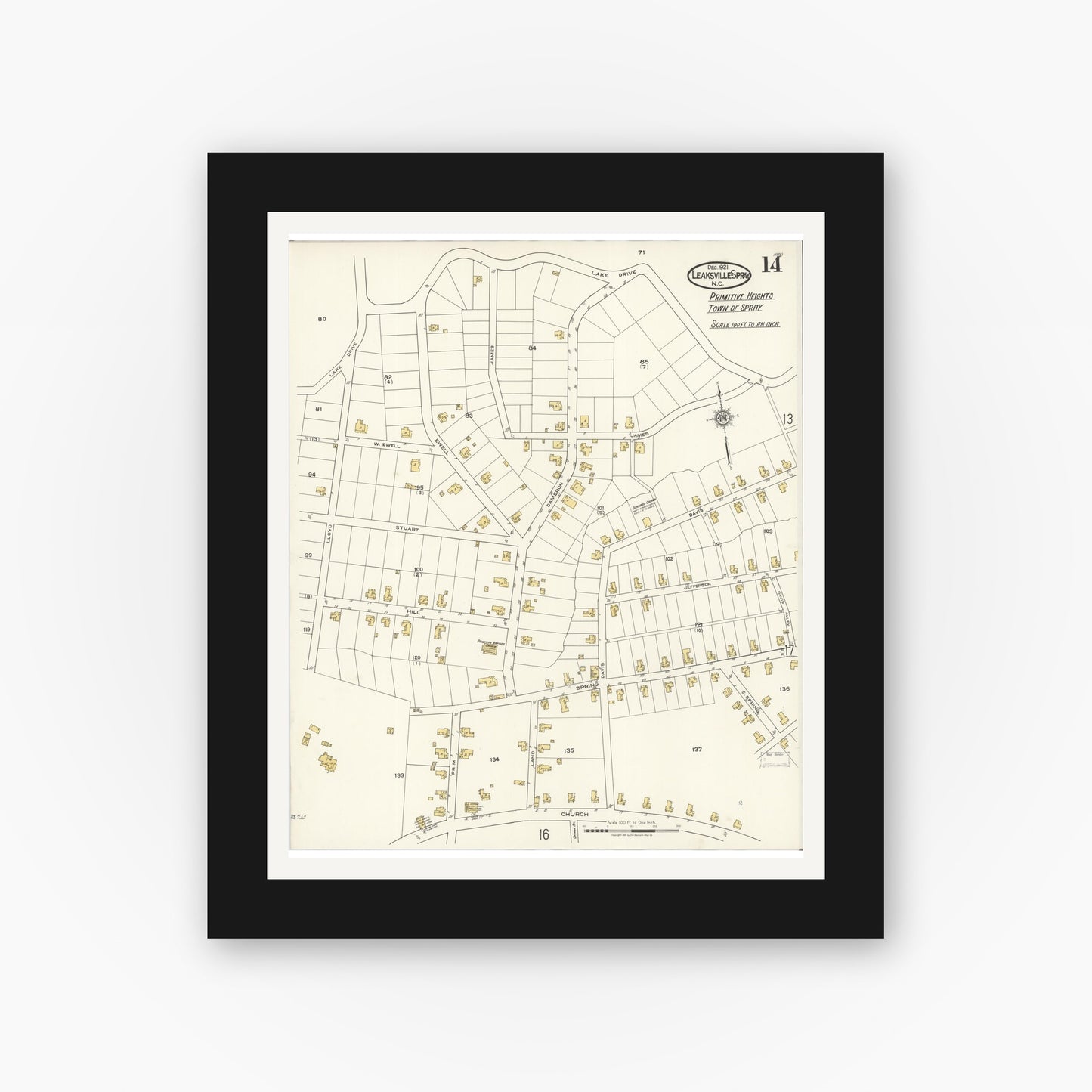 Old map wall art mockup — black gallery frame with white mat — Sanborn Fire Insurance Map from Leaksville-spray, Rockingham County, North Carolina (1921), Sheet #0014