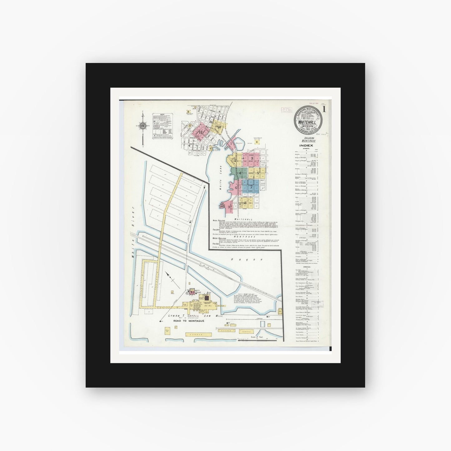 Old map wall art mockup — black gallery frame with white mat — Sanborn Fire Insurance Map from Whitehall, Muskegon County, Michigan (1910), Sheet #0001