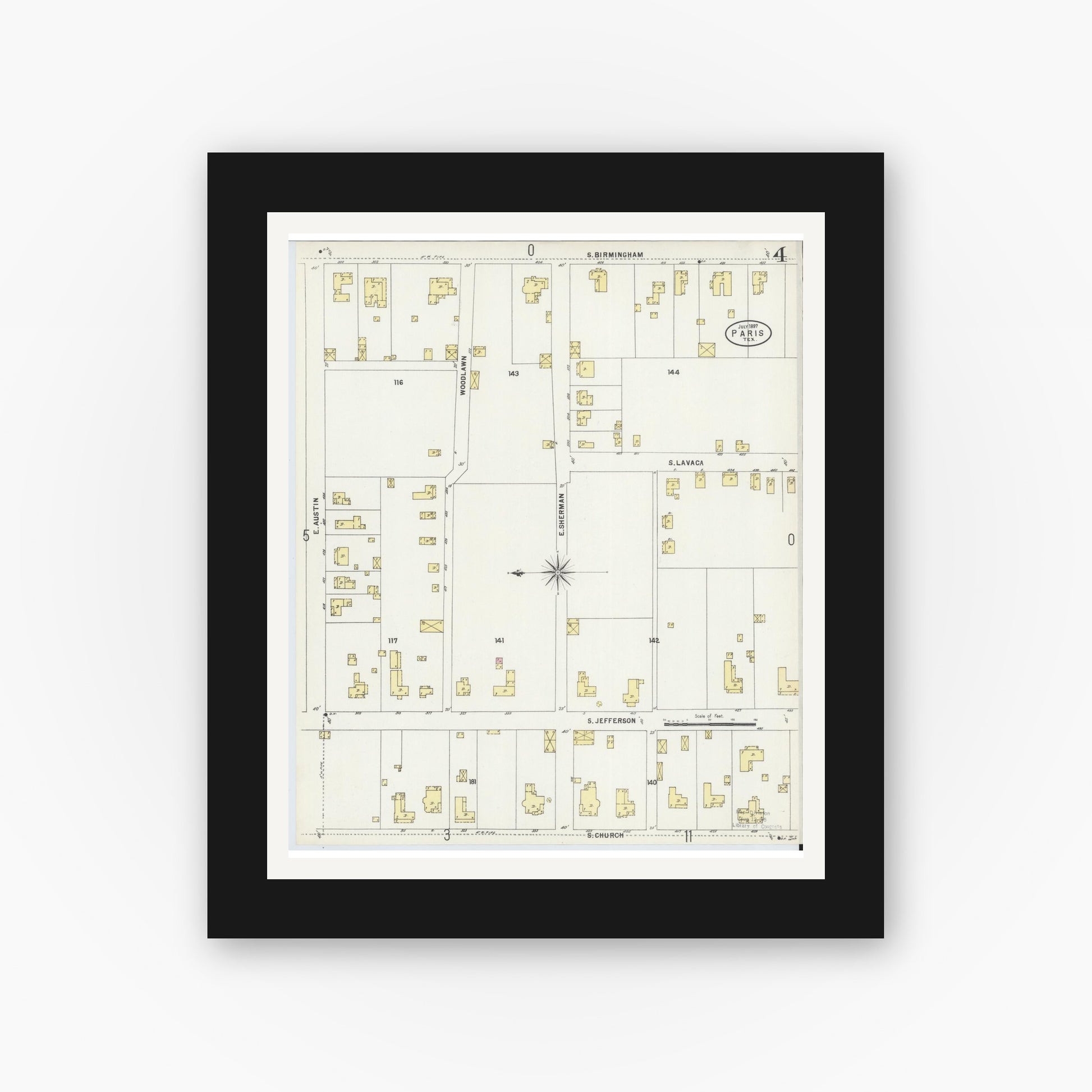 Old map wall art mockup — black gallery frame with white mat — Sanborn Fire Insurance Map from Paris, Lamar County, Texas (1897), Sheet #0004
