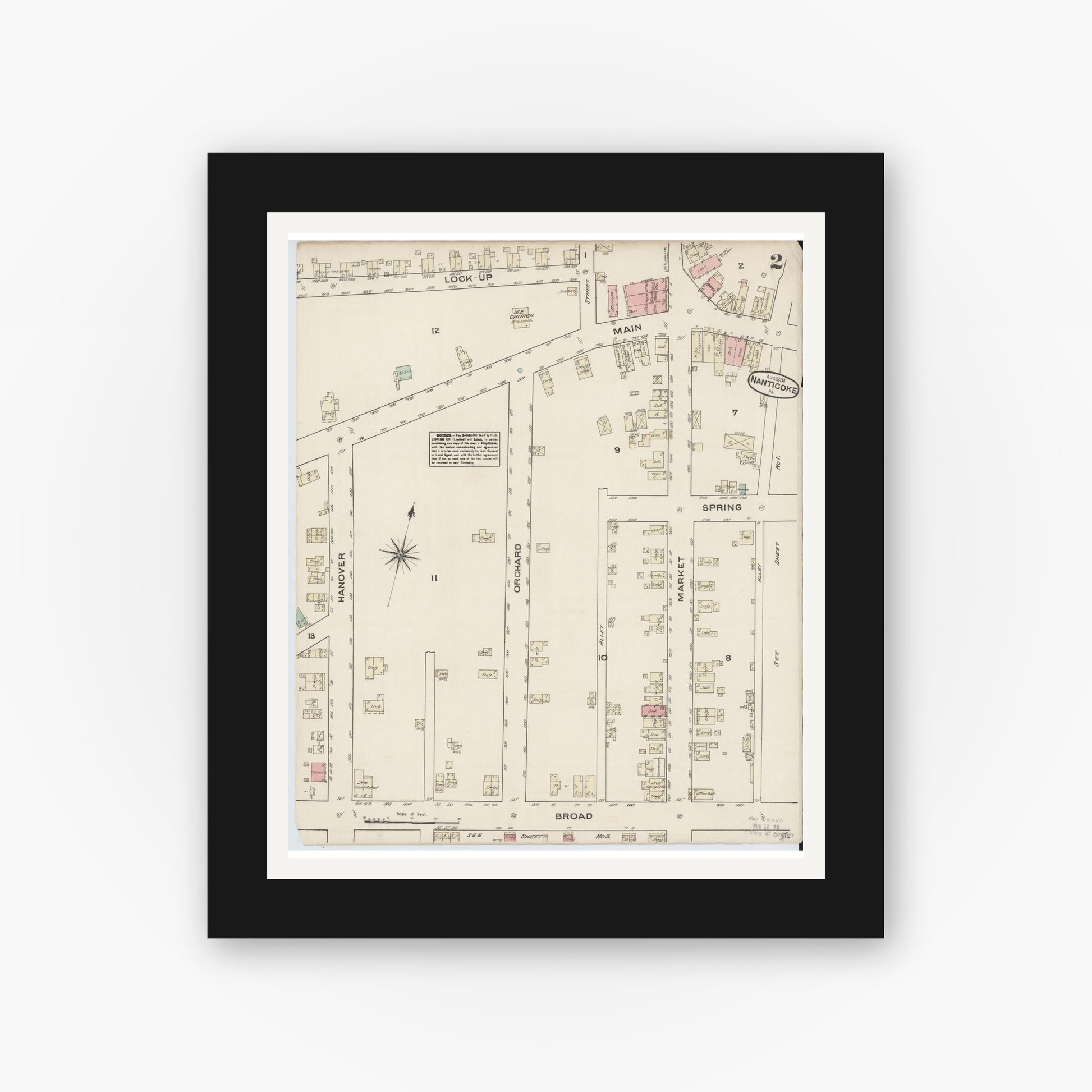 Old map wall art mockup — black gallery frame with white mat — Sanborn Fire Insurance Map from Nanticoke, Luzerne County, Pennsylvania (1884), Sheet #0002