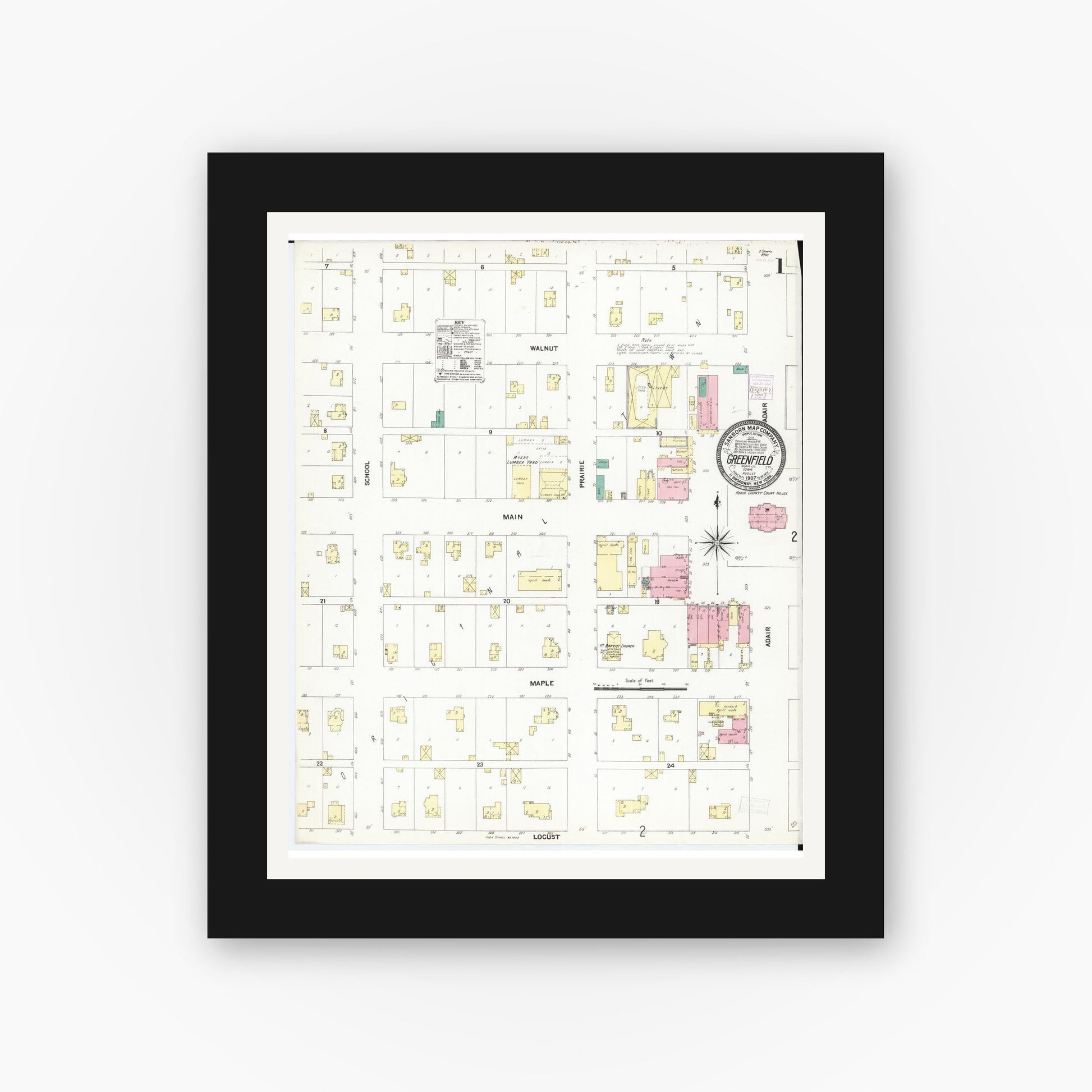 Old map wall art mockup — black gallery frame with white mat — Sanborn Fire Insurance Map from Greenfield, Adair County, Iowa (1907) â€” Complete Set