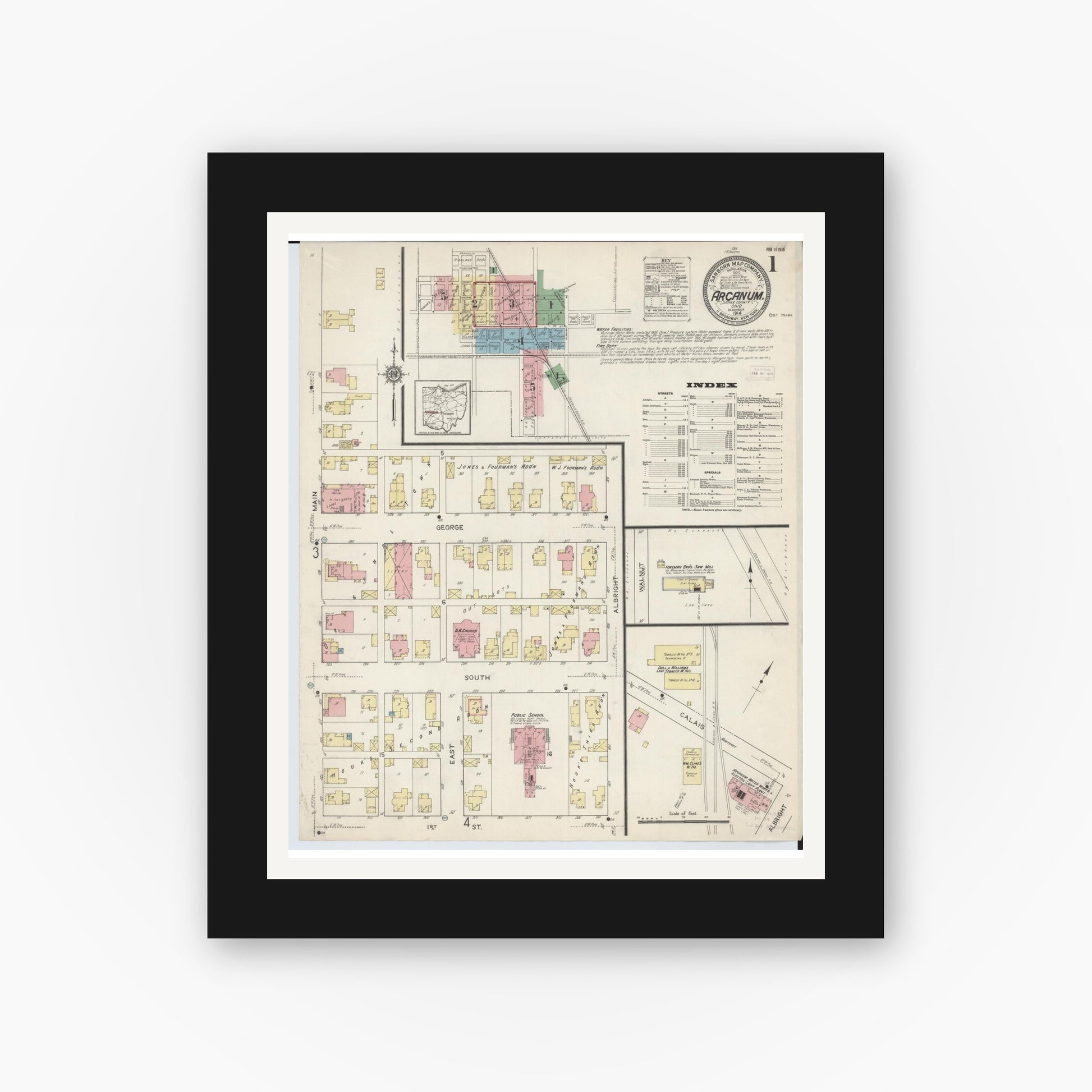 Old map wall art mockup — black gallery frame with white mat — Sanborn Fire Insurance Map from Arcanum, Darke County, Ohio (1914), Sheet #0001