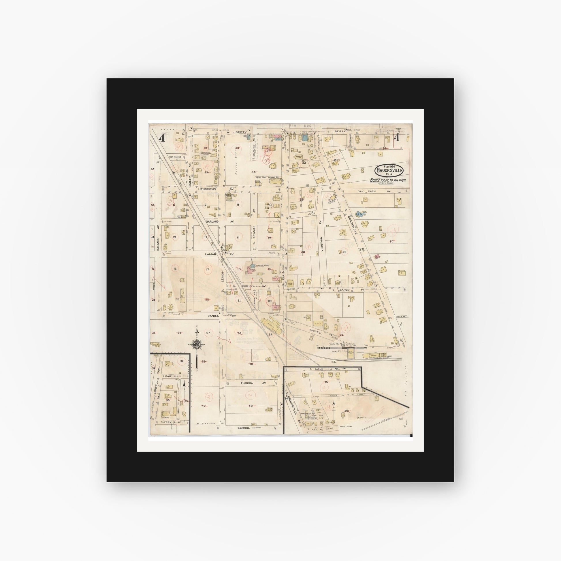 Old map wall art mockup — black gallery frame with white mat — Sanborn Fire Insurance Map from Brooksville, Hernando County, Florida (1945), Sheet #0004
