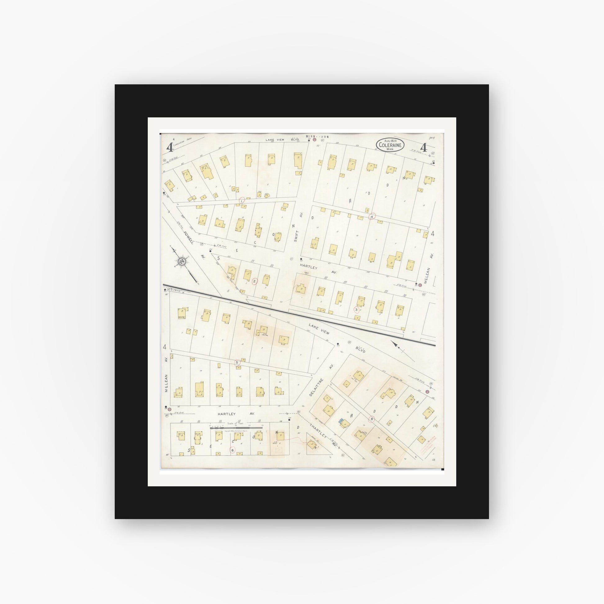 Old map wall art mockup — black gallery frame with white mat — Sanborn Fire Insurance Map from Coleraine, Itasca County, Minnesota (1944), Sheet #0004