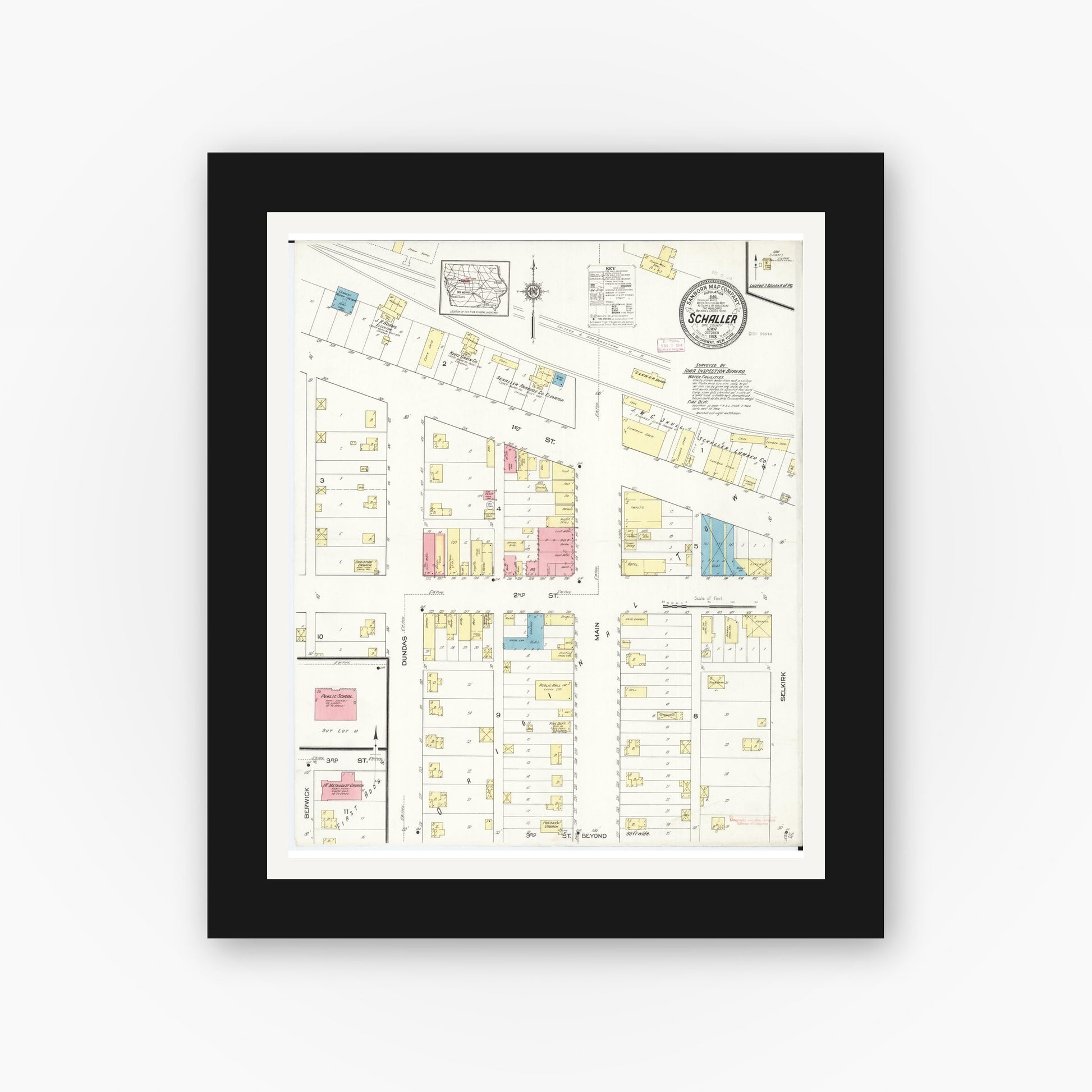 Old map wall art mockup — black gallery frame with white mat — Sanborn Fire Insurance Map from Schaller, Sac County, Iowa (1913), Sheet #0001