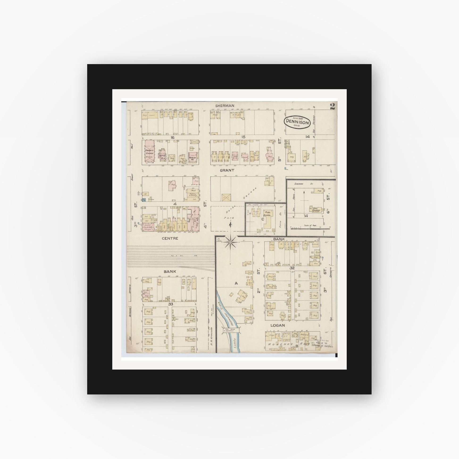 Old map wall art mockup — black gallery frame with white mat — Sanborn Fire Insurance Map from Dennison, Tuscarawas County, Ohio (1887), Sheet #0002