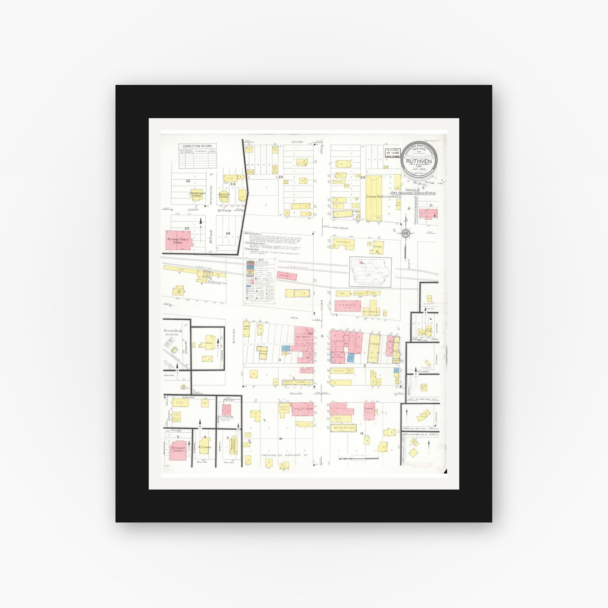 Old map wall art mockup — black gallery frame with white mat — Sanborn Fire Insurance Map from Ruthven, Palo Alto County, Iowa (1933), Sheet #0001